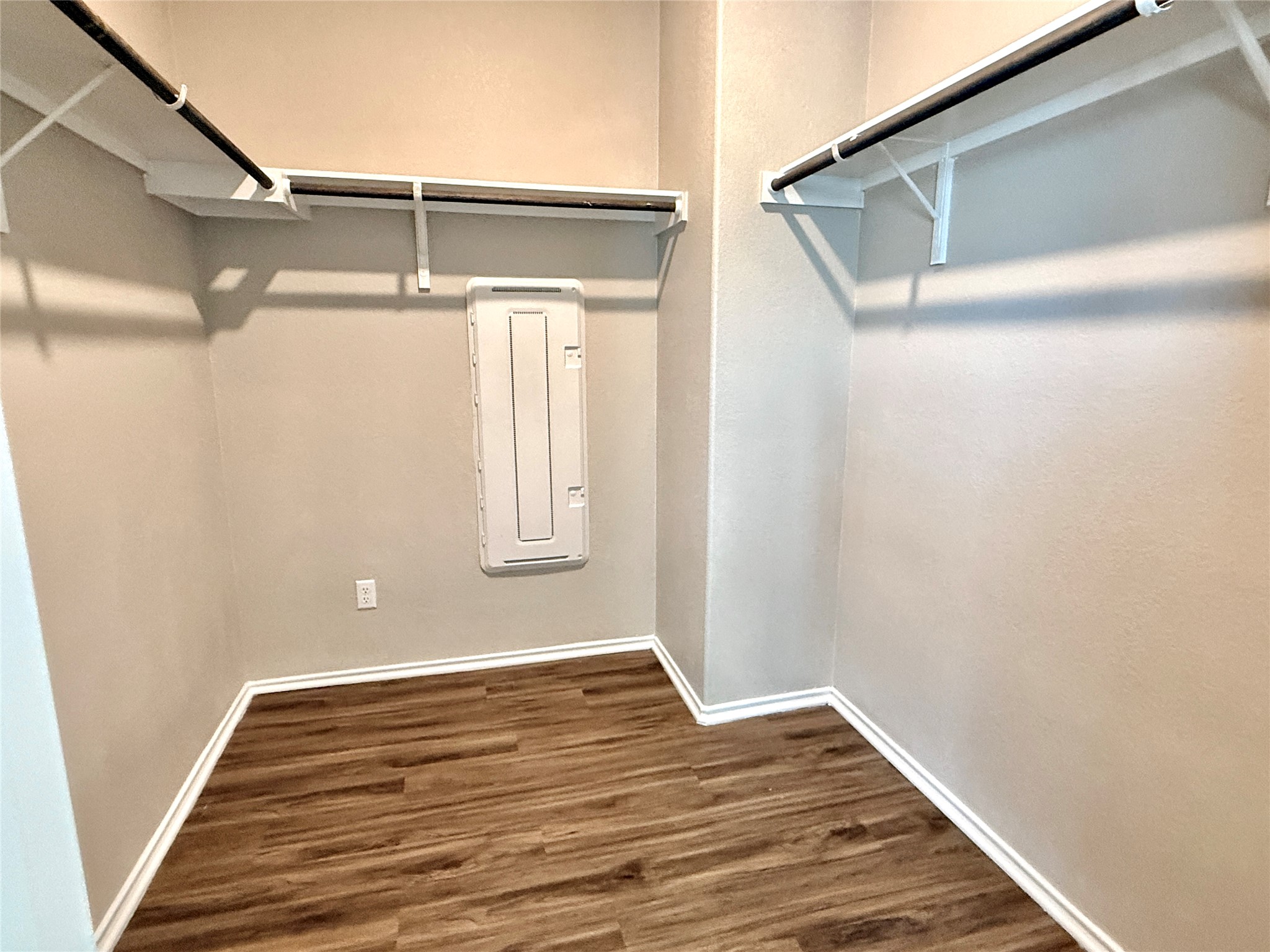 129 Perfect World Loop Jarrell, TX 76537 - Photo 15 of 31 Functional organization awaits in this ample walk-in closet, ready to store and simplify.