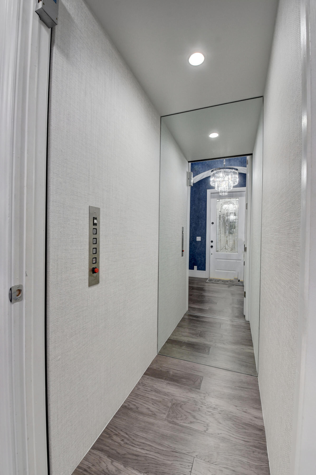 921 Osceola Drive, Unit 4 Boca Raton, FL 33432 - Photo 19 of 46 a view of a hallway with wooden floor