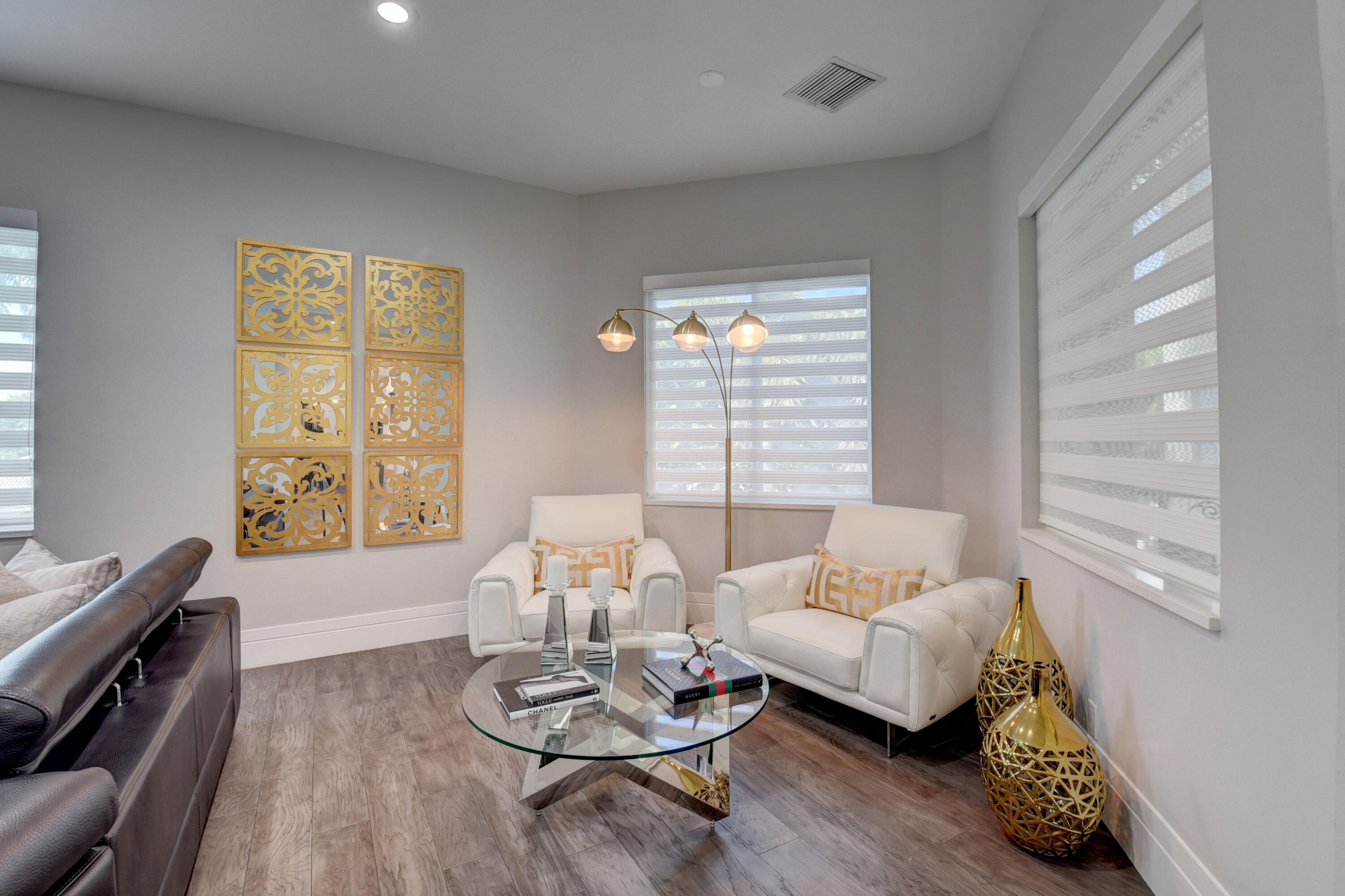 921 Osceola Drive, Unit 4 Boca Raton, FL 33432 - Photo 20 of 46 a living room with furniture and a window