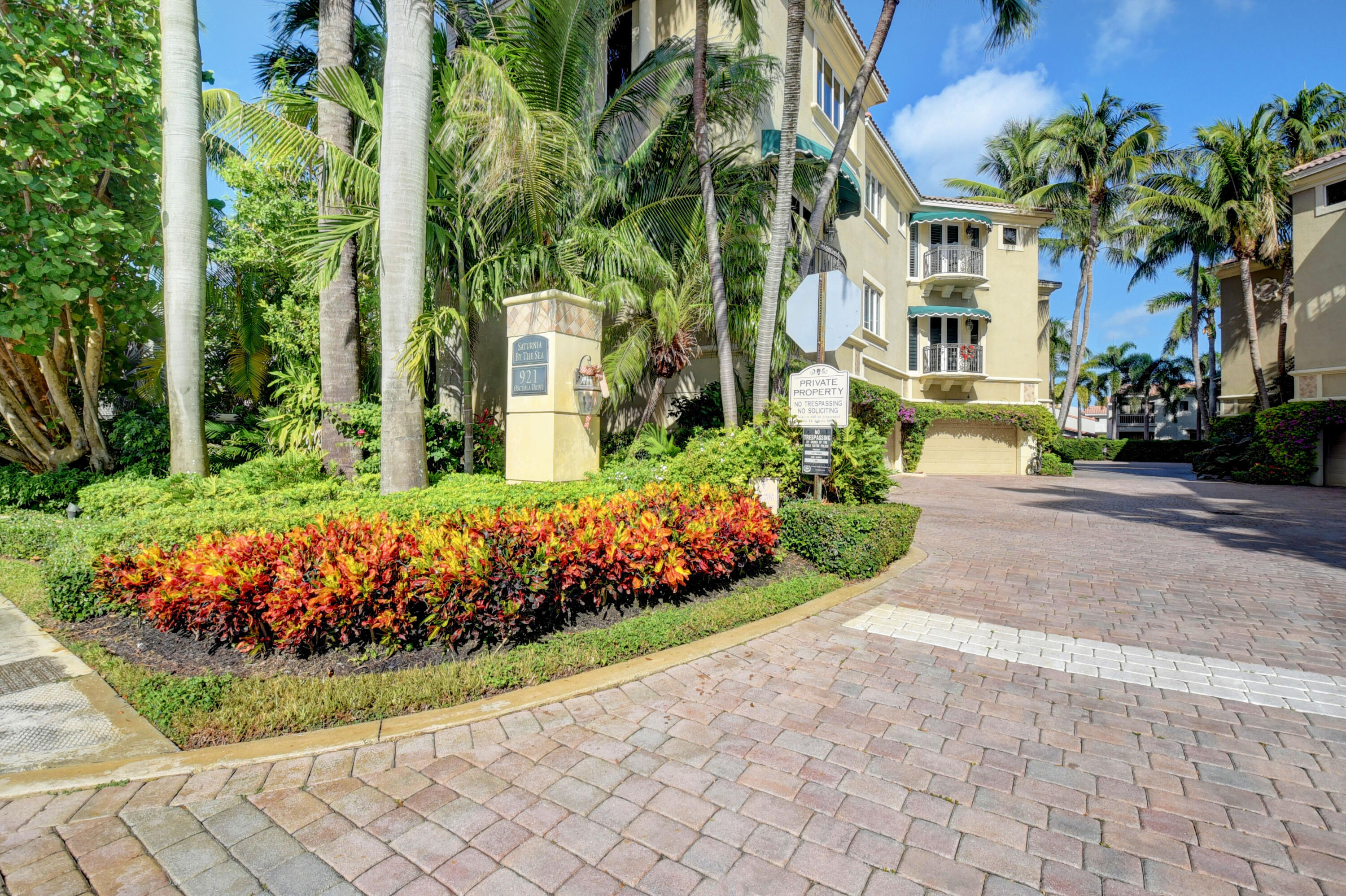 921 Osceola Drive, Unit 4 Boca Raton, FL 33432 - Photo 2 of 46 a view of a garden with flowers