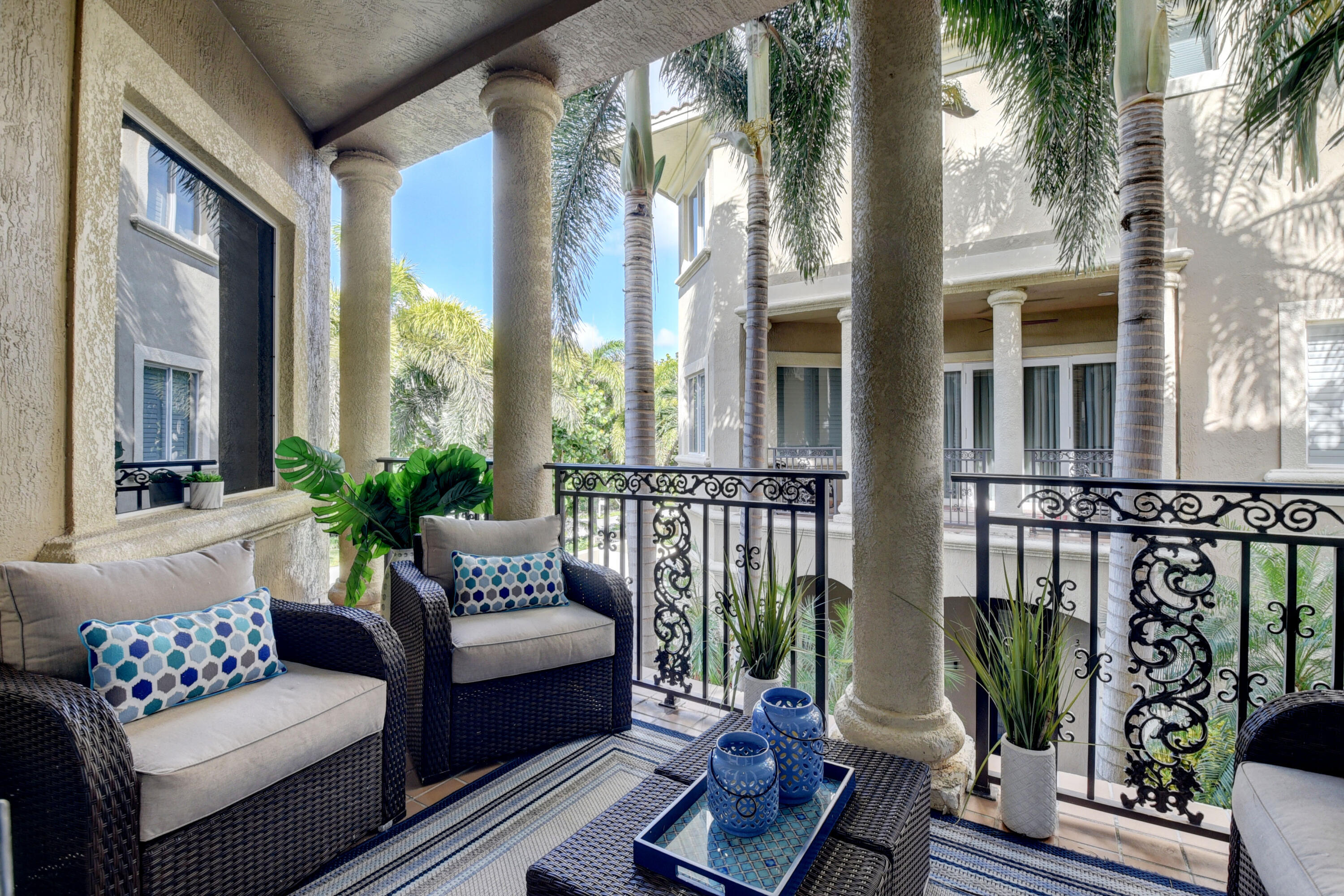 921 Osceola Drive, Unit 4 Boca Raton, FL 33432 - Photo 24 of 46 a view of a balcony with furniture