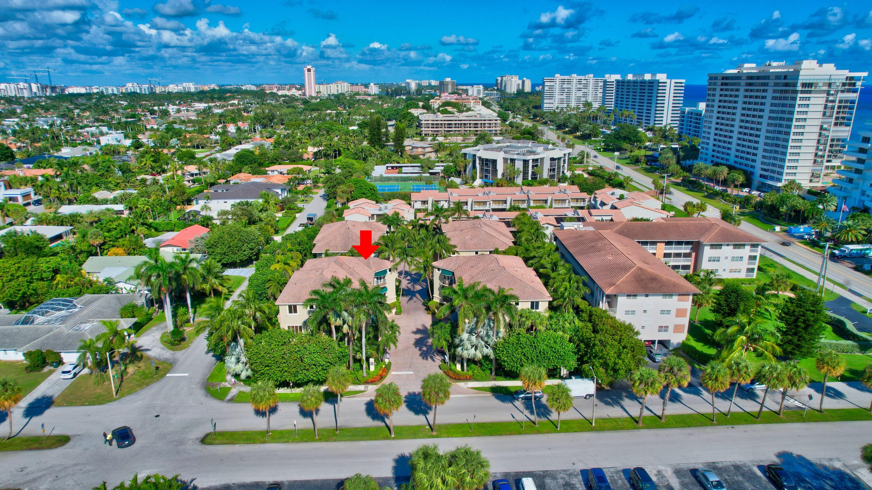 921 Osceola Drive, Unit 4 Boca Raton, FL 33432 - Photo 41 of 46 a view of a city and flowers