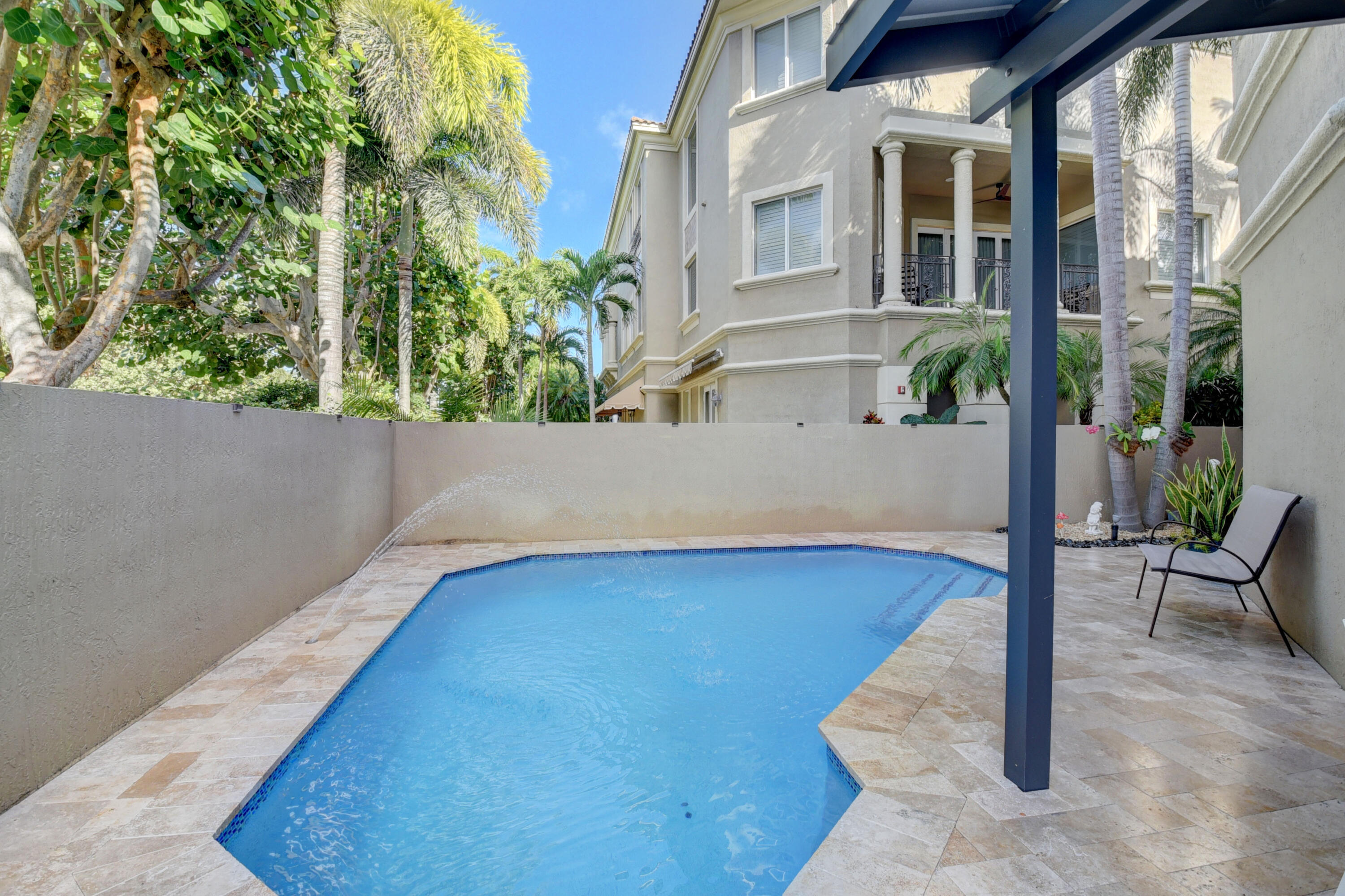 921 Osceola Drive, Unit 4 Boca Raton, FL 33432 - Photo 7 of 46 a view of backyard with patio
