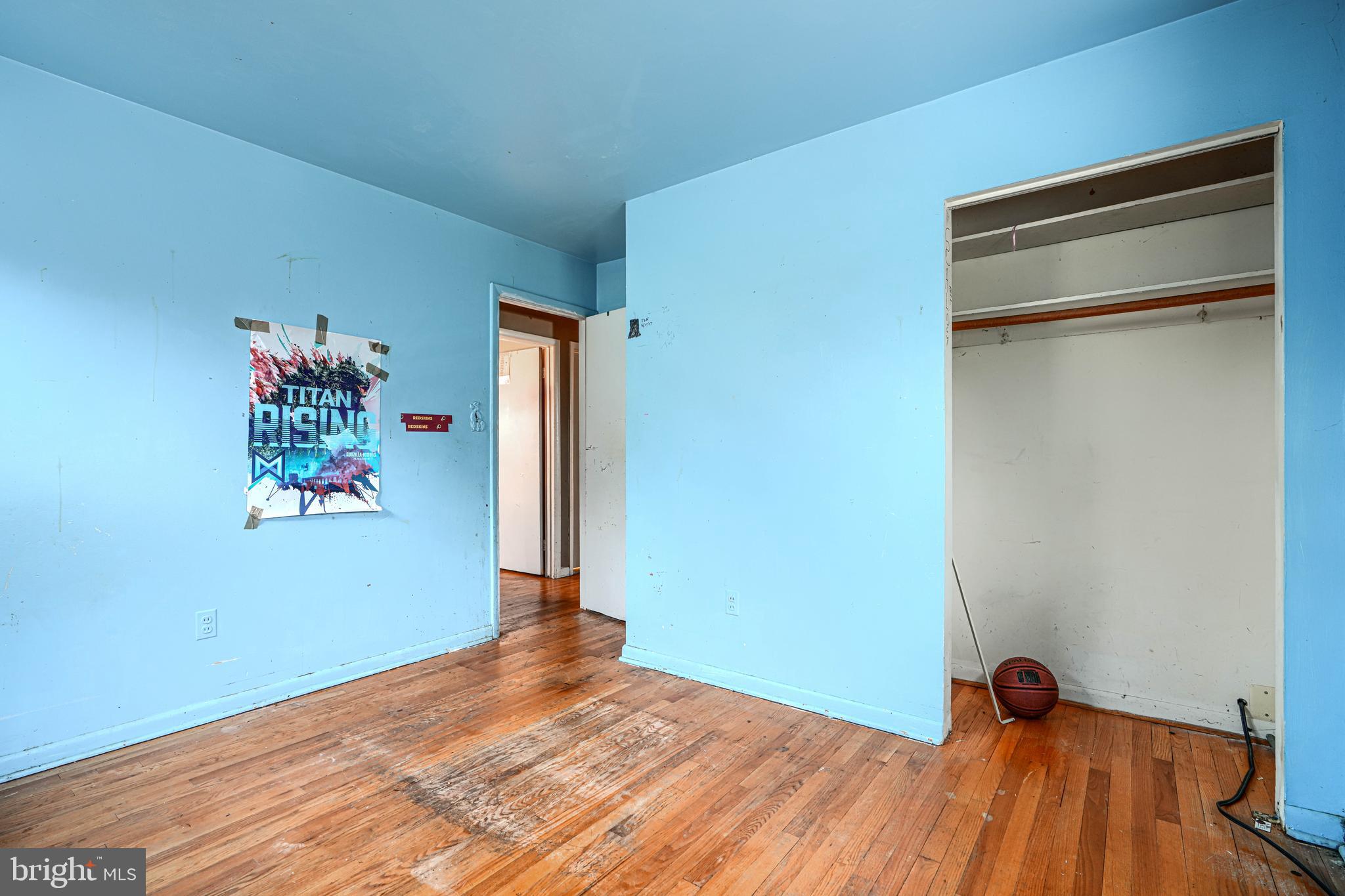 6908 Drylog Street Capitol Heights, MD 20743 - Photo 14 of 38 a view of a room with wooden floor and closet