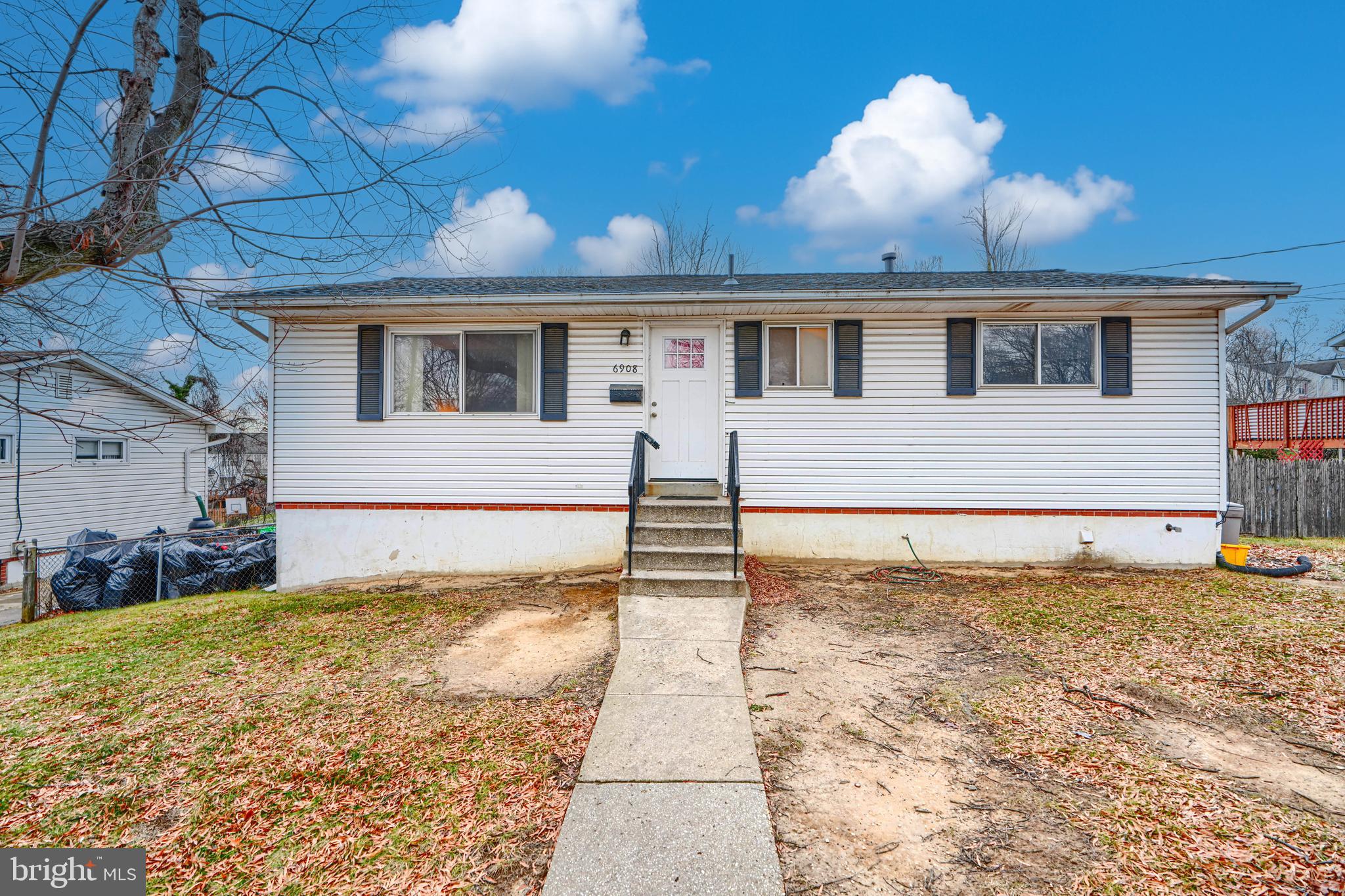 6908 Drylog Street Capitol Heights, MD 20743 - Photo 2 of 38 a view of a house with a yard
