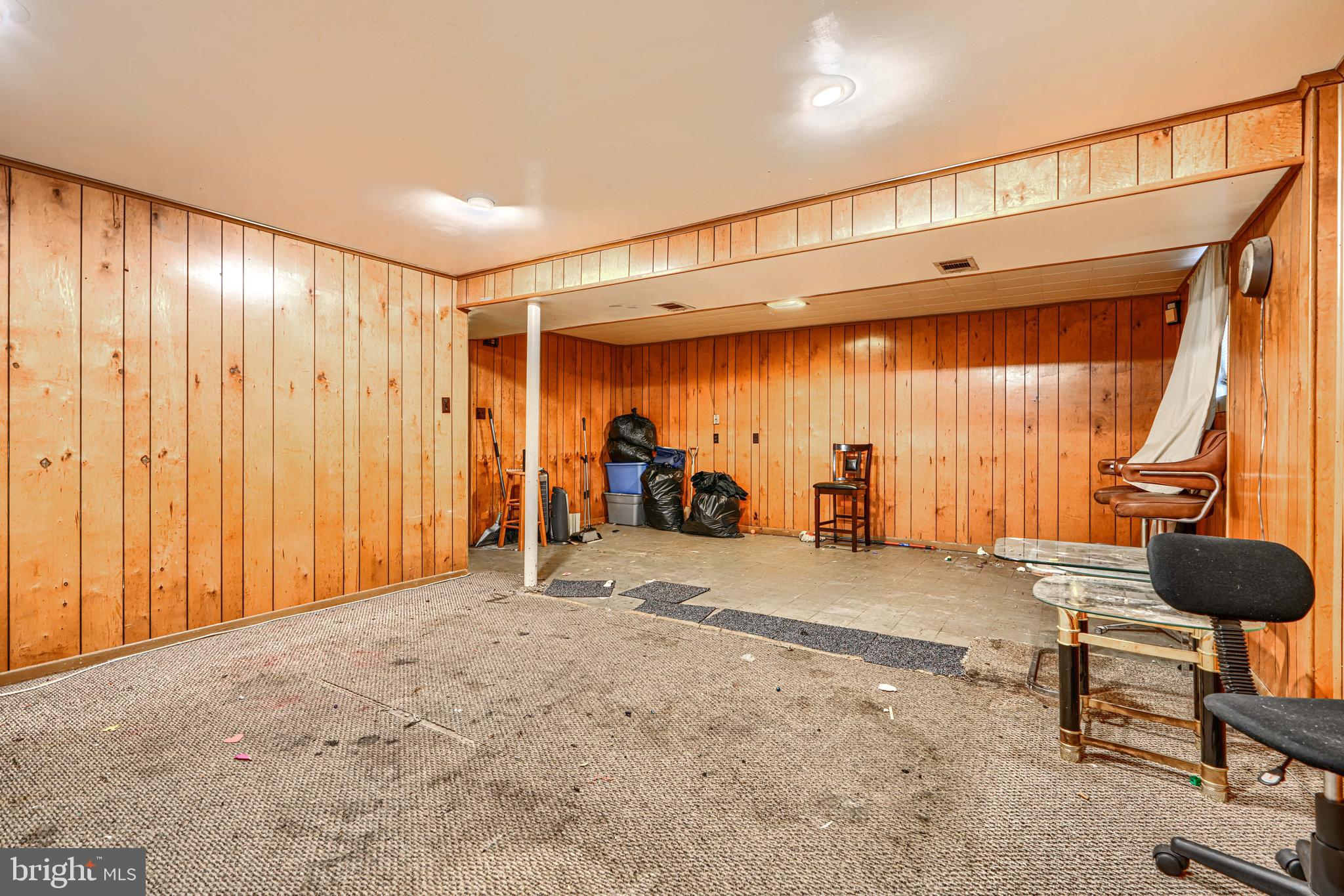 6908 Drylog Street Capitol Heights, MD 20743 - Photo 25 of 38 a view of a livingroom with furniture and a window