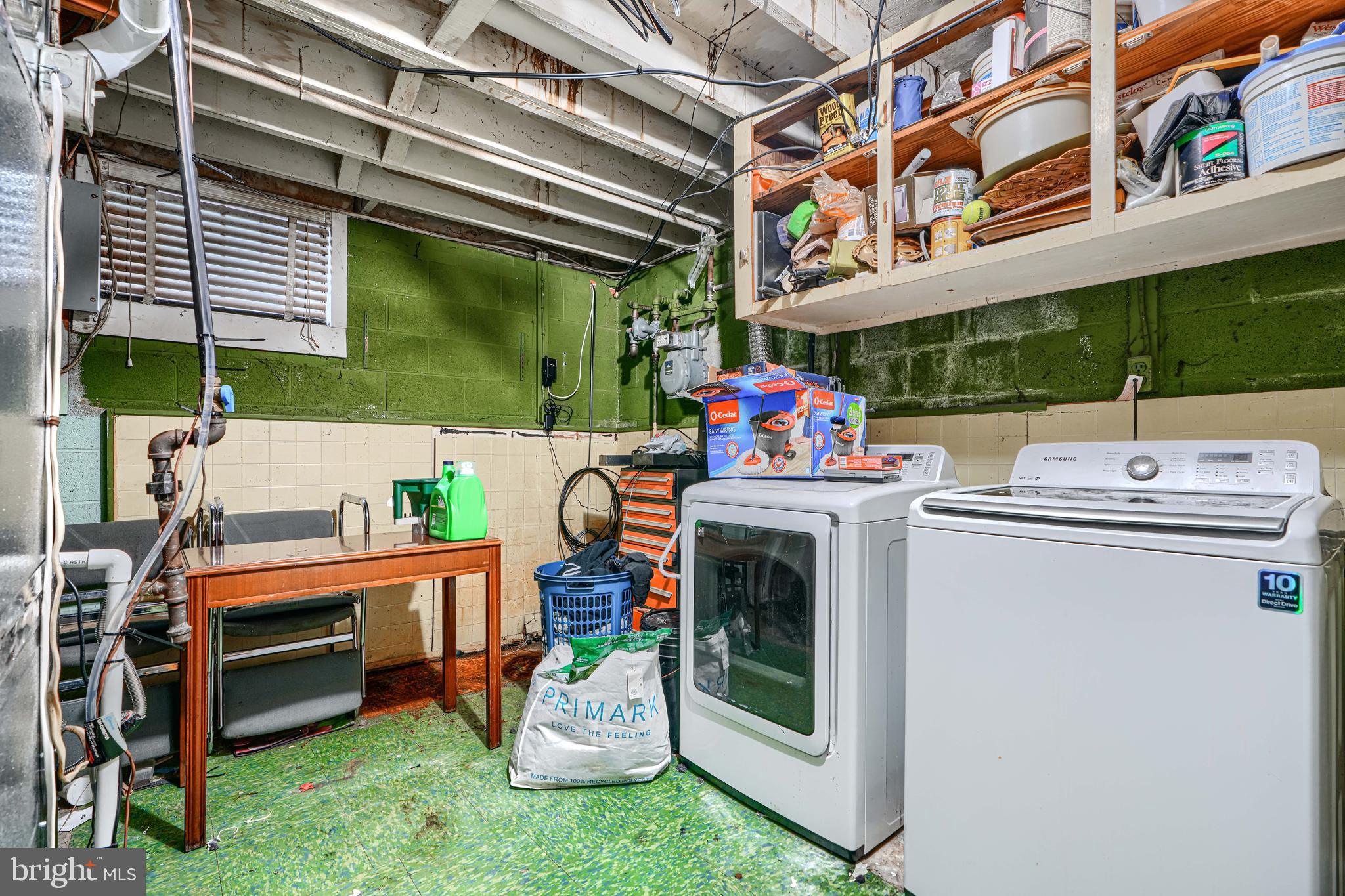 6908 Drylog Street Capitol Heights, MD 20743 - Photo 29 of 38 a view of a chairs and table in the back yard of the house