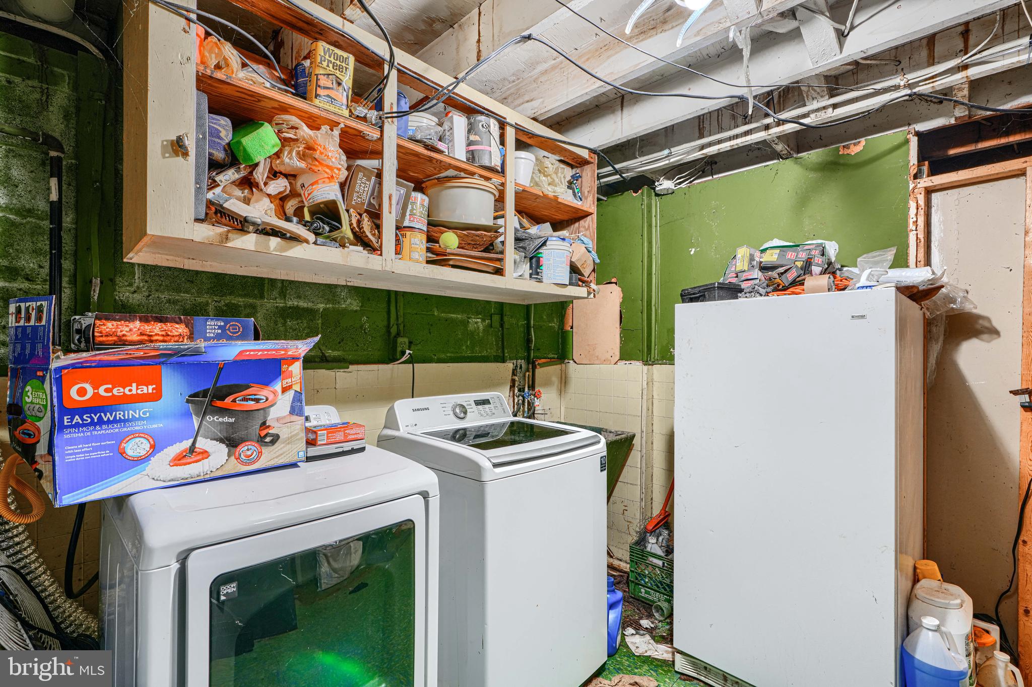 6908 Drylog Street Capitol Heights, MD 20743 - Photo 32 of 38 a utility room with dryer and washer