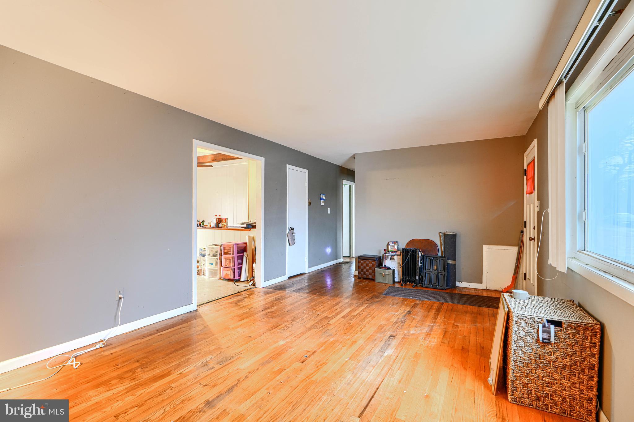6908 Drylog Street Capitol Heights, MD 20743 - Photo 6 of 38 a very nice looking room with a large window