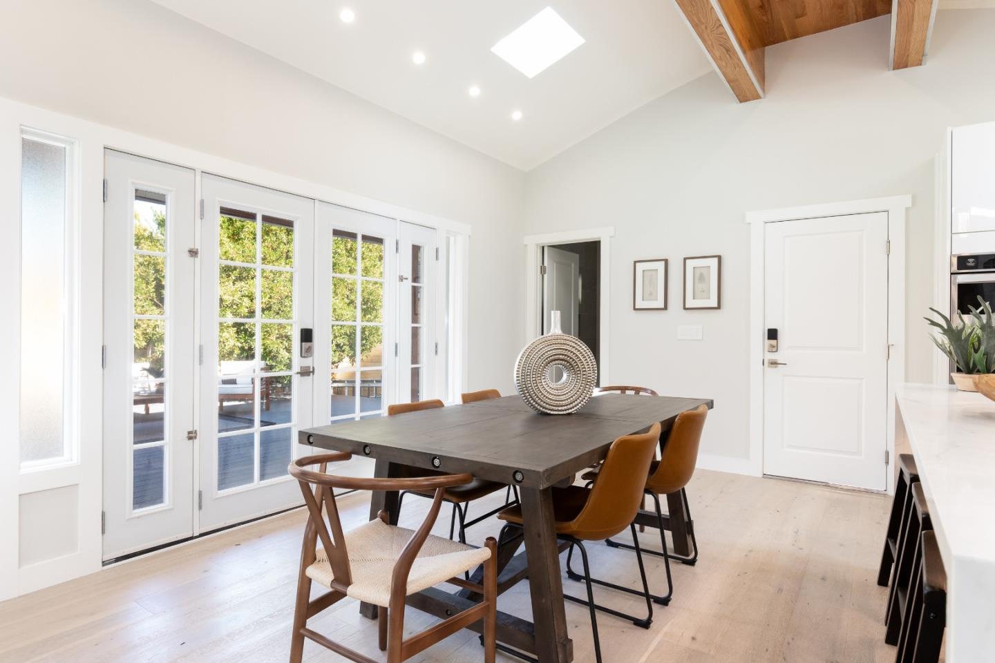 3266 Quandt Road Lafayette, CA 94549 - Photo 12 of 37 a view of a dining room with furniture and wooden floor