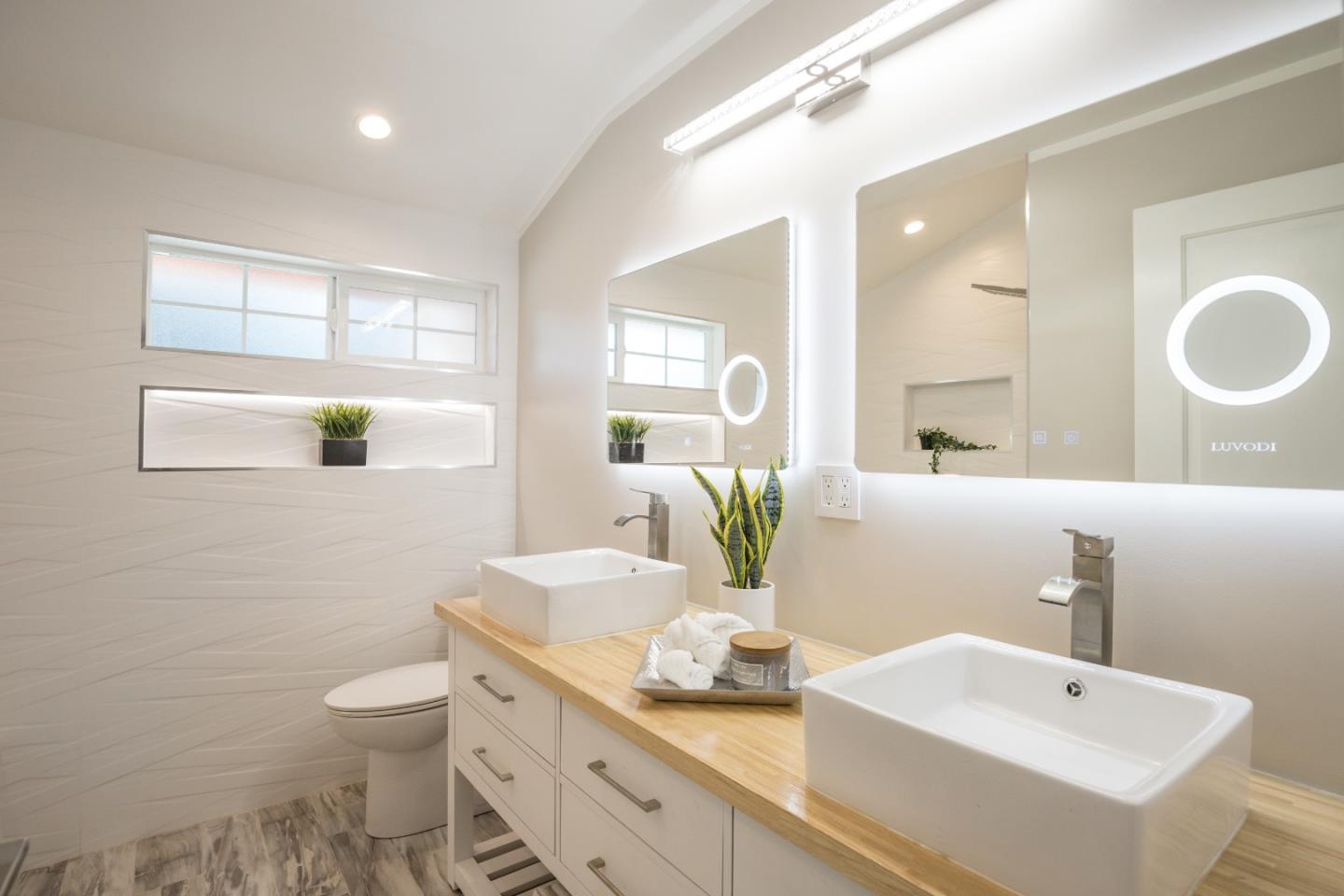 3266 Quandt Road Lafayette, CA 94549 - Photo 18 of 37 a bathroom with a granite countertop sink mirror and toilet