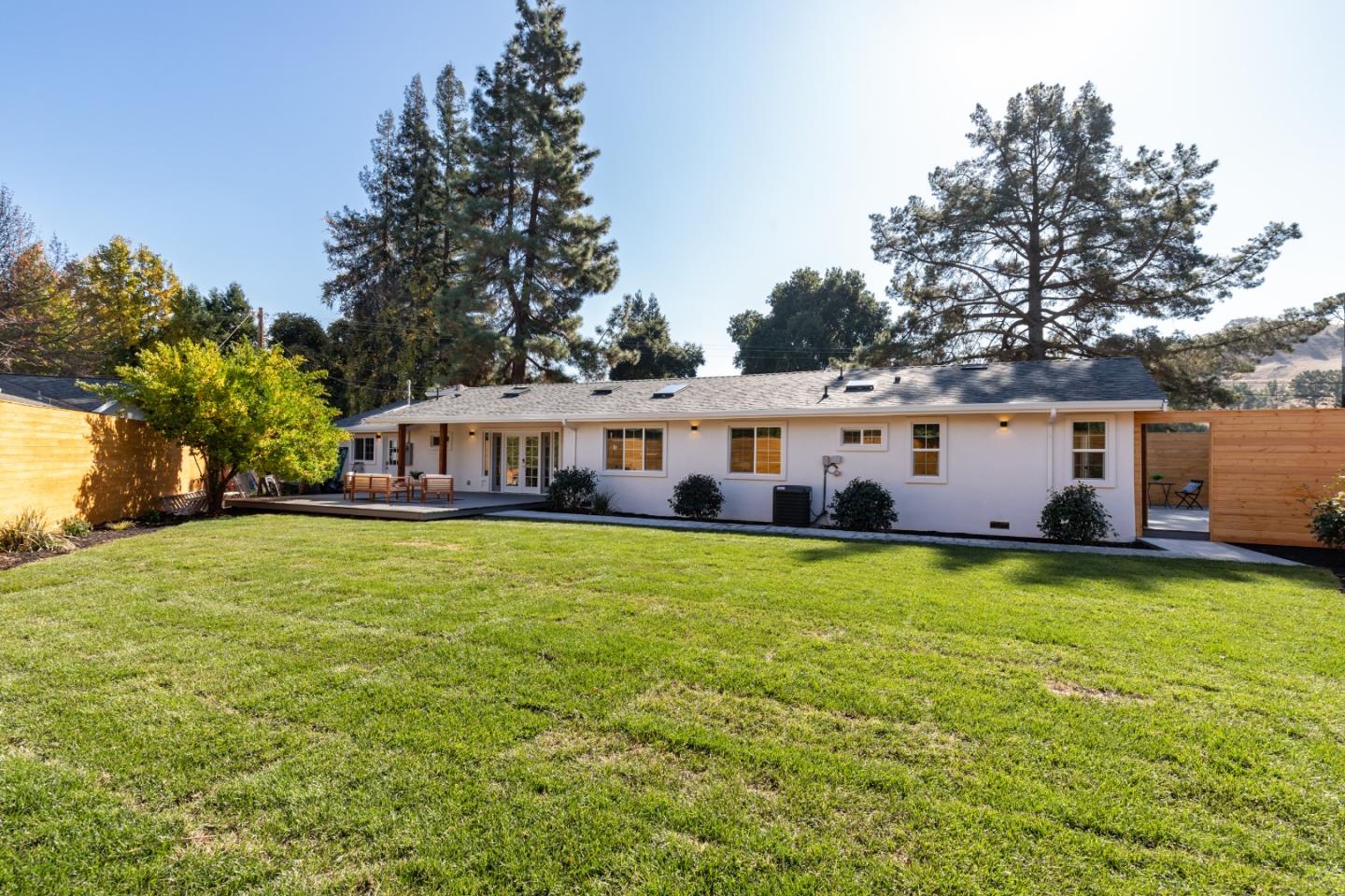 3266 Quandt Road Lafayette, CA 94549 - Photo 33 of 37 a front view of a house with a yard table and chairs