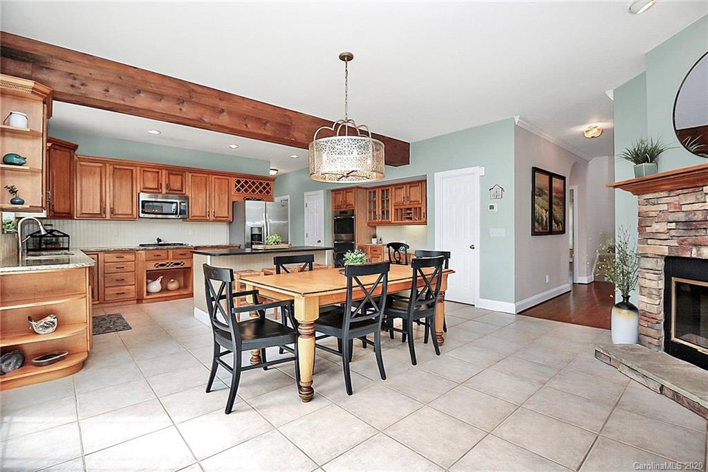 2601 Walker Road Matthews, NC 28105 - Photo 14 of 48 a view of a dining area with furniture