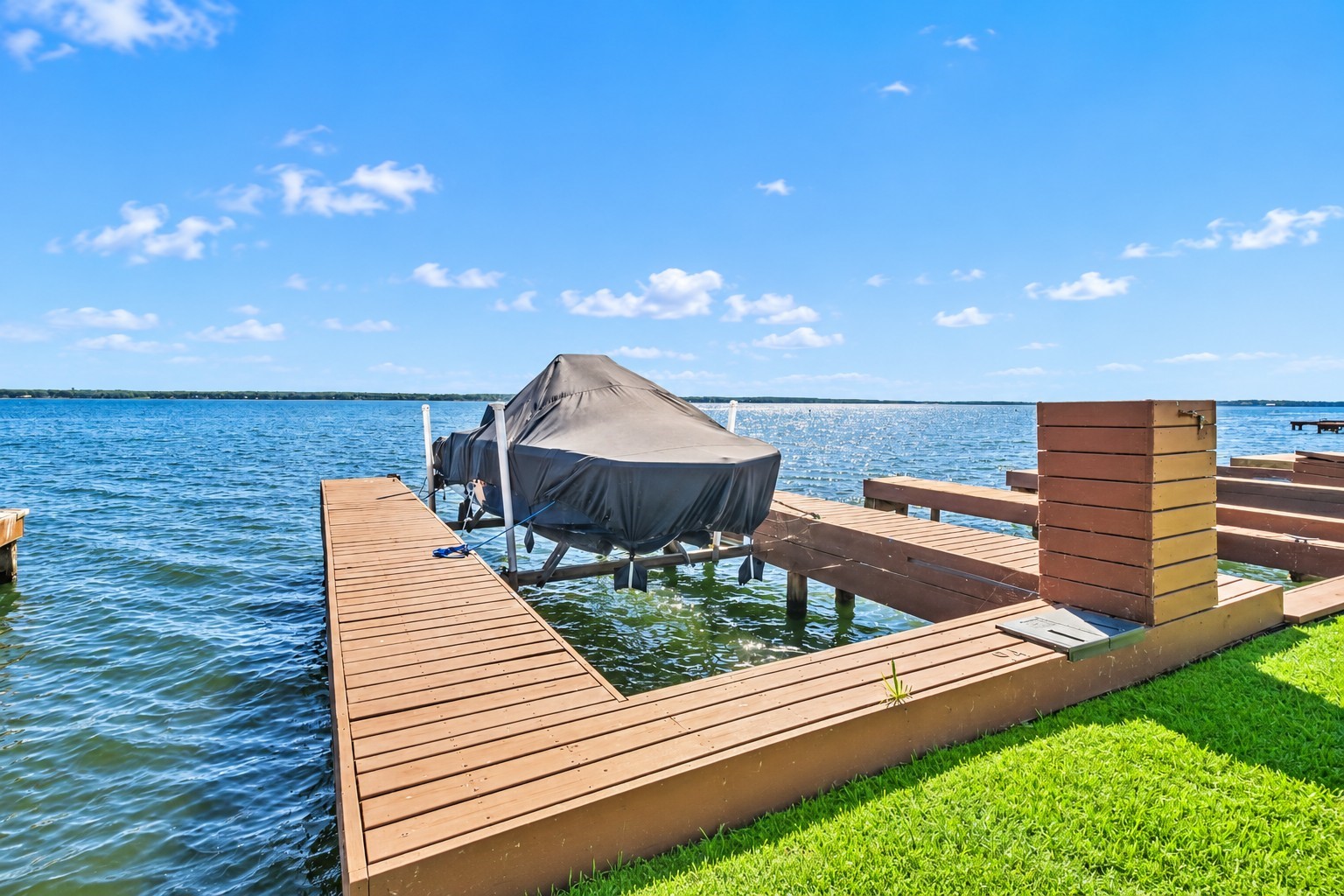 801 River Road, Unit 112F Montgomery, TX 77356 - Photo 22 of 27 Private boat slip offers direct access to the open waters of Lake Conroe. The dock at slip #94 was completely rebuilt at the end of 2025, while the existing boat lift was retained, providing convenient waterfront access just steps from the condo.