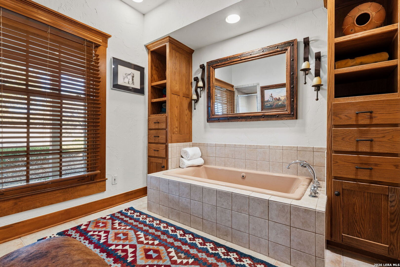 521 Bluff Creek Road North Center Point, TX 78010 - Photo 26 of 74 a bathroom with a bathtub and shower