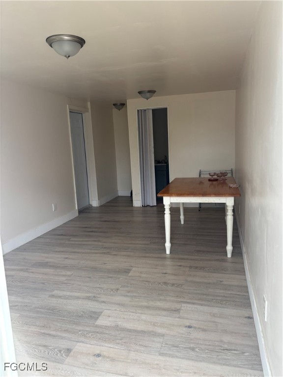 716 Pondella Road Fort Myers, FL 33903 - Photo 1 of 4 a room with a table and chairs