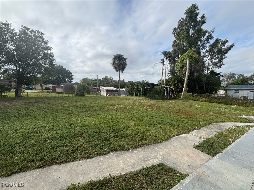 716 Pondella Road Fort Myers, FL 33903 - Photo 4 of 4 a view of a park with large trees