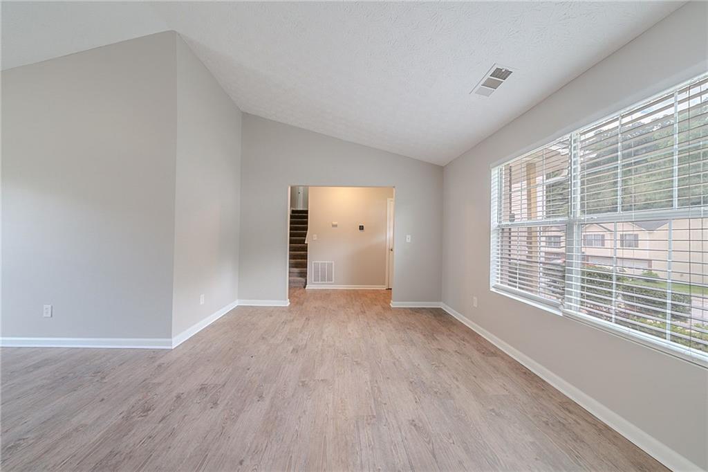 2183 Ramblewood Circle Decatur, GA 30035 - Photo 7 of 37 a view of an empty room with a window