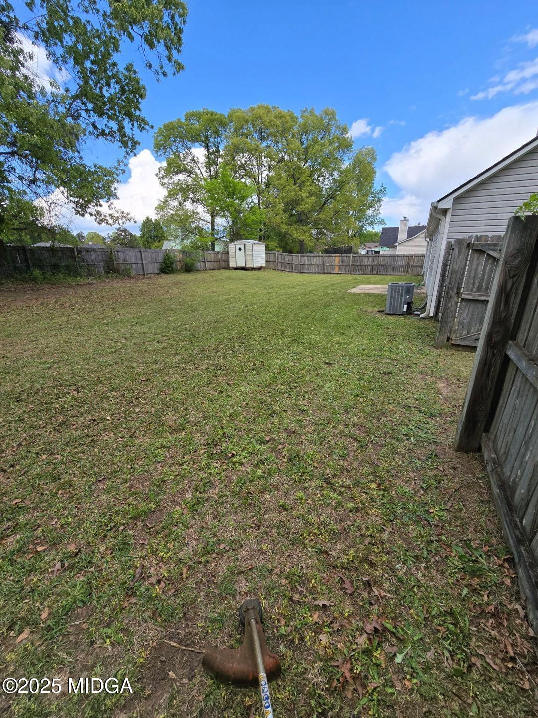 198 Apple Valley Road Macon, GA 31217 - Photo 11 of 12 a view of a garden with an outdoor space