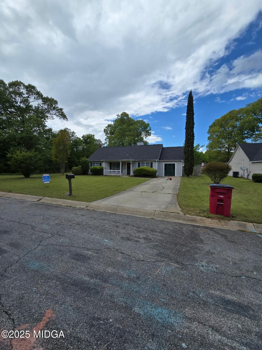 198 Apple Valley Road Macon, GA 31217 - Photo 12 of 12 a view of a road with a big yard and large trees