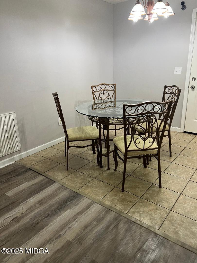 198 Apple Valley Road Macon, GA 31217 - Photo 5 of 12 a view of a dining room with furniture