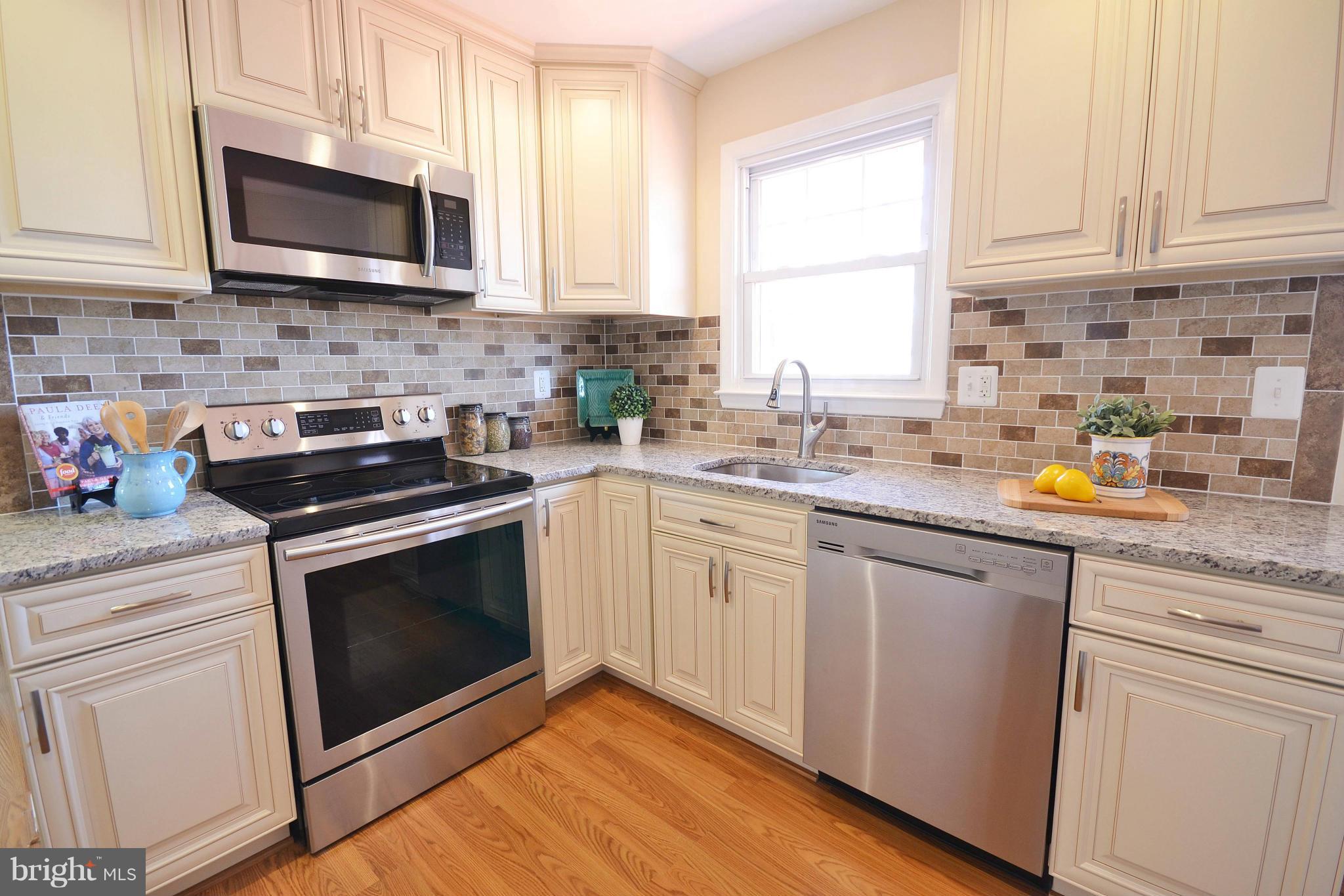 7524 Lemon Tree Court Hanover, MD 21076 - Photo 12 of 30 Gourmet Kitchen w/ Stainless Steel Appliances