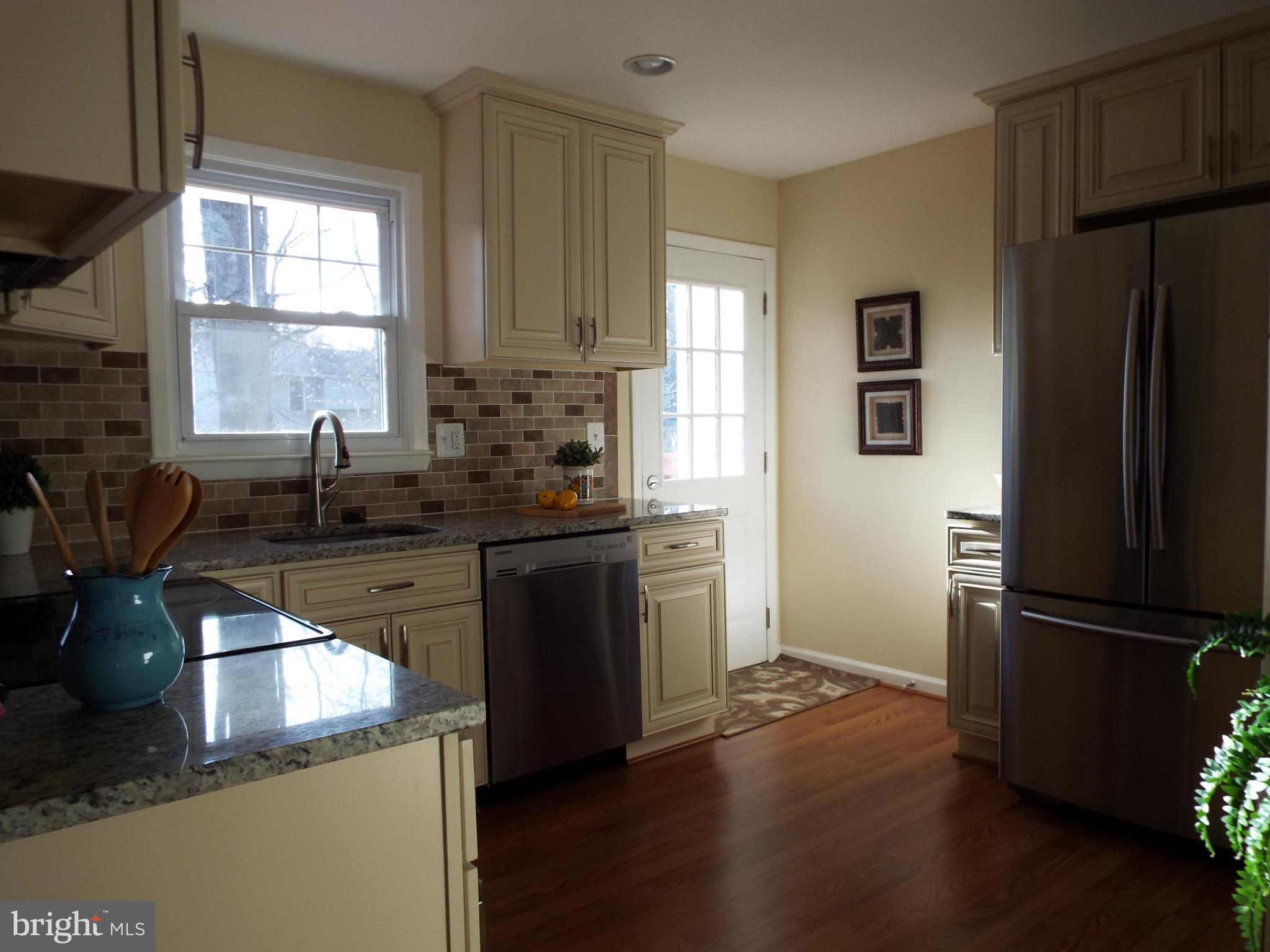 7524 Lemon Tree Court Hanover, MD 21076 - Photo 9 of 30 KitchenGourmet Kitchen w/ Stainless Steel Applianc