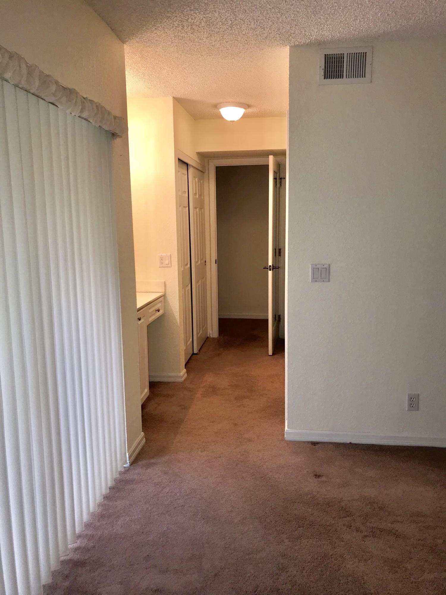 8249 Thames Boulevard, Unit B Boca Raton, FL 33433 - Photo 22 of 46 a view of a room with an empty space and a window
