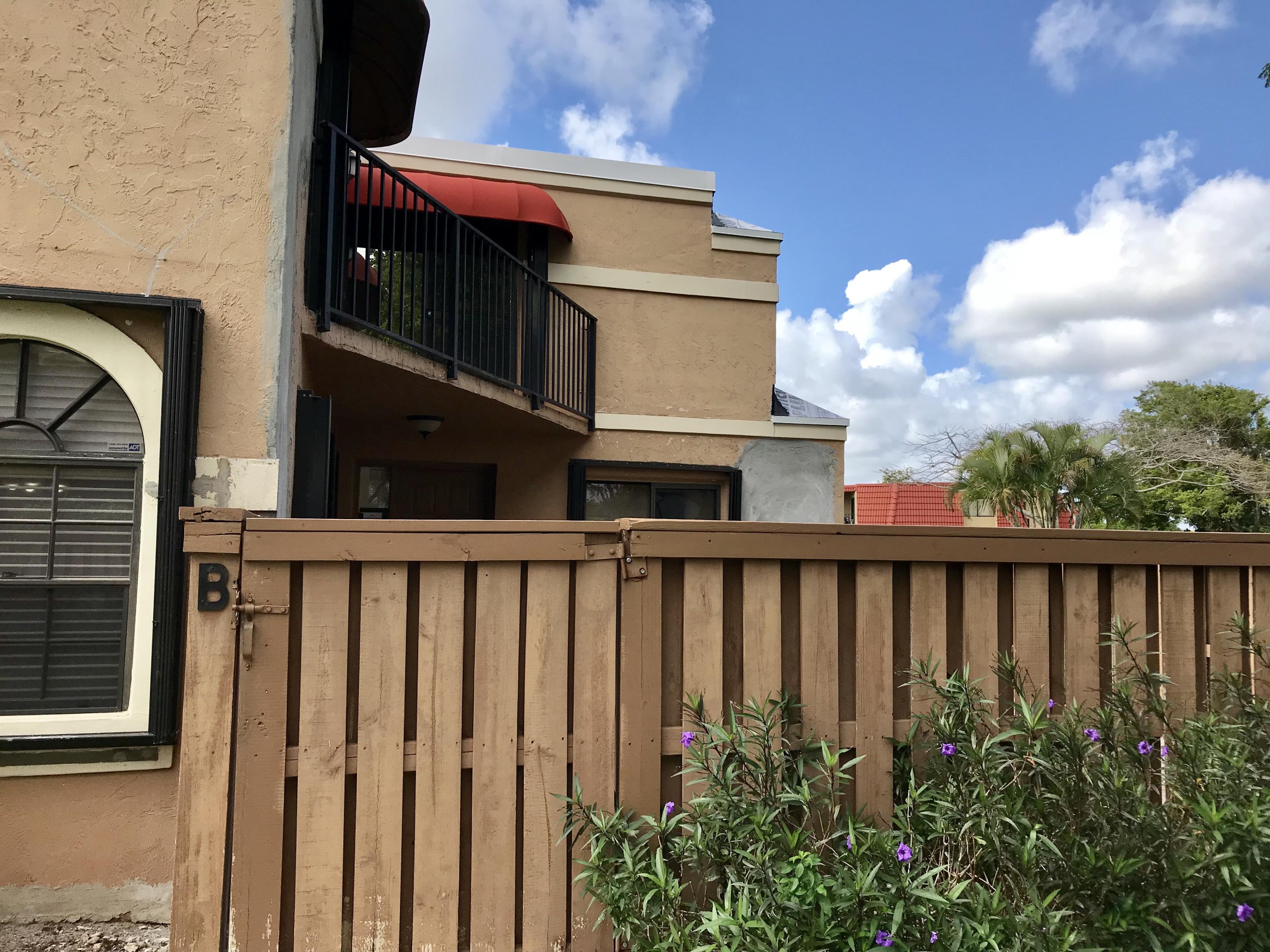 8249 Thames Boulevard, Unit B Boca Raton, FL 33433 - Photo 35 of 46 a view of a balcony with an outdoor space