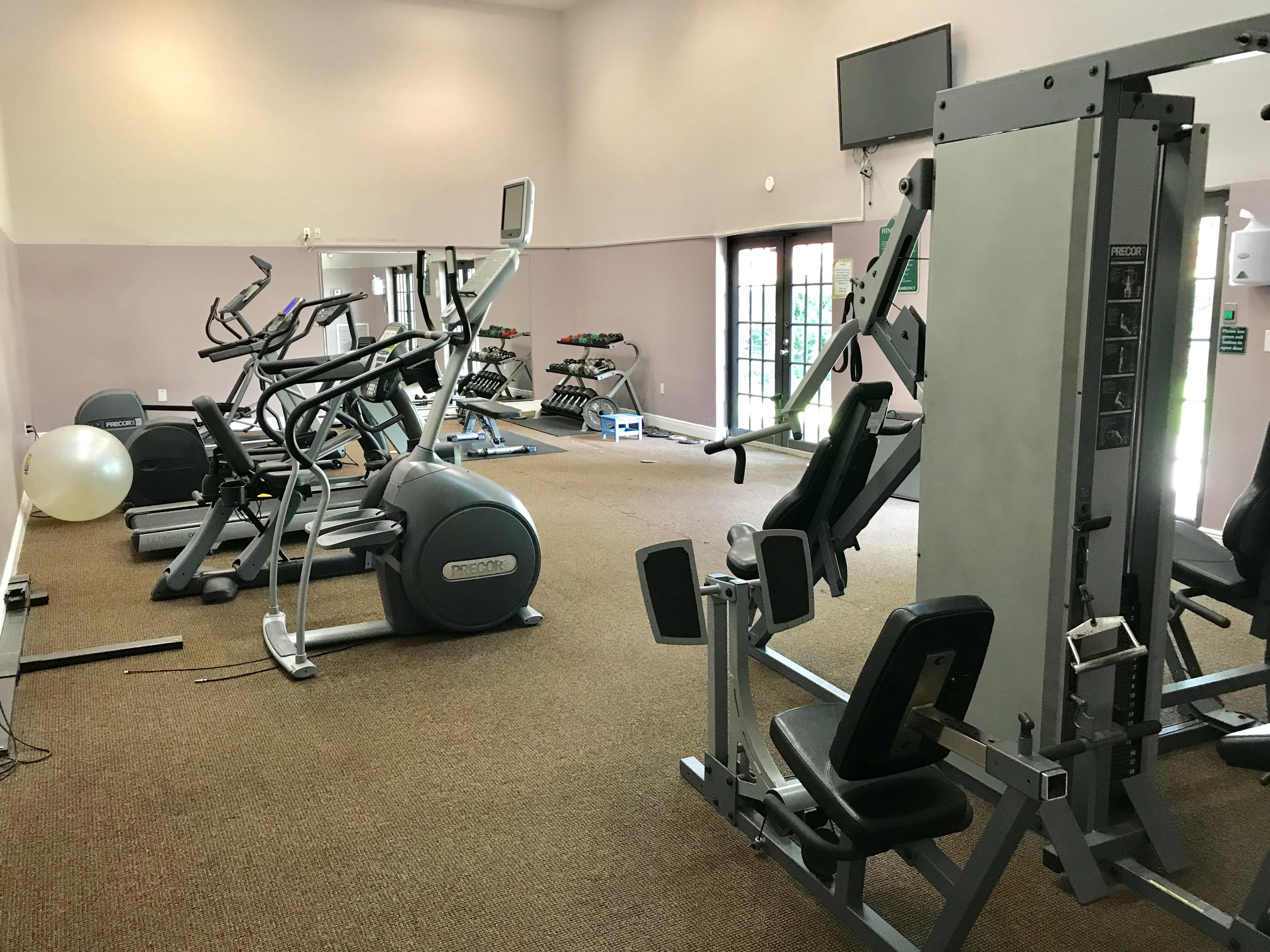 8249 Thames Boulevard, Unit B Boca Raton, FL 33433 - Photo 41 of 46 a view of a room with gym equipment