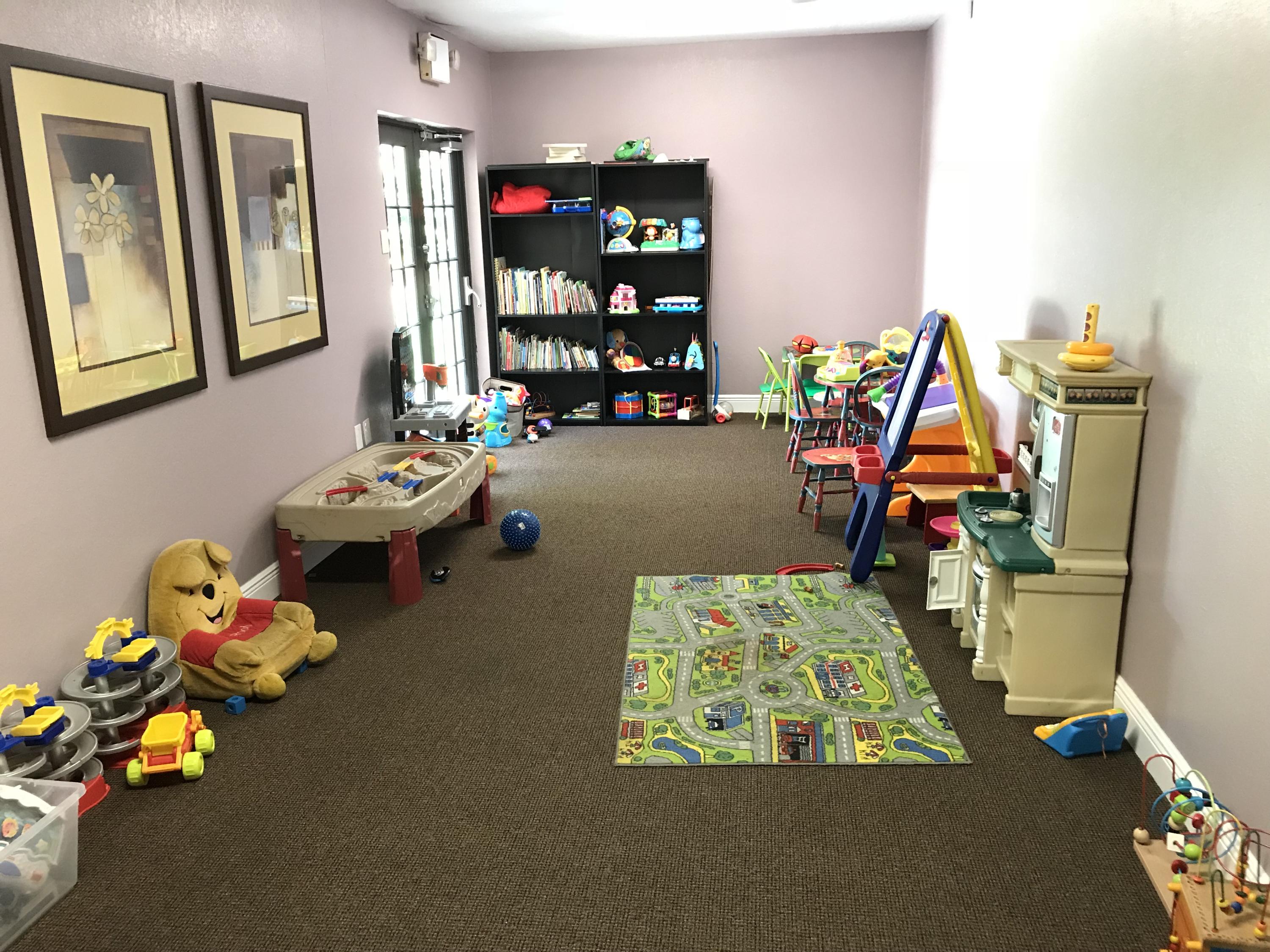 8249 Thames Boulevard, Unit B Boca Raton, FL 33433 - Photo 44 of 46 a children room with toys and toys