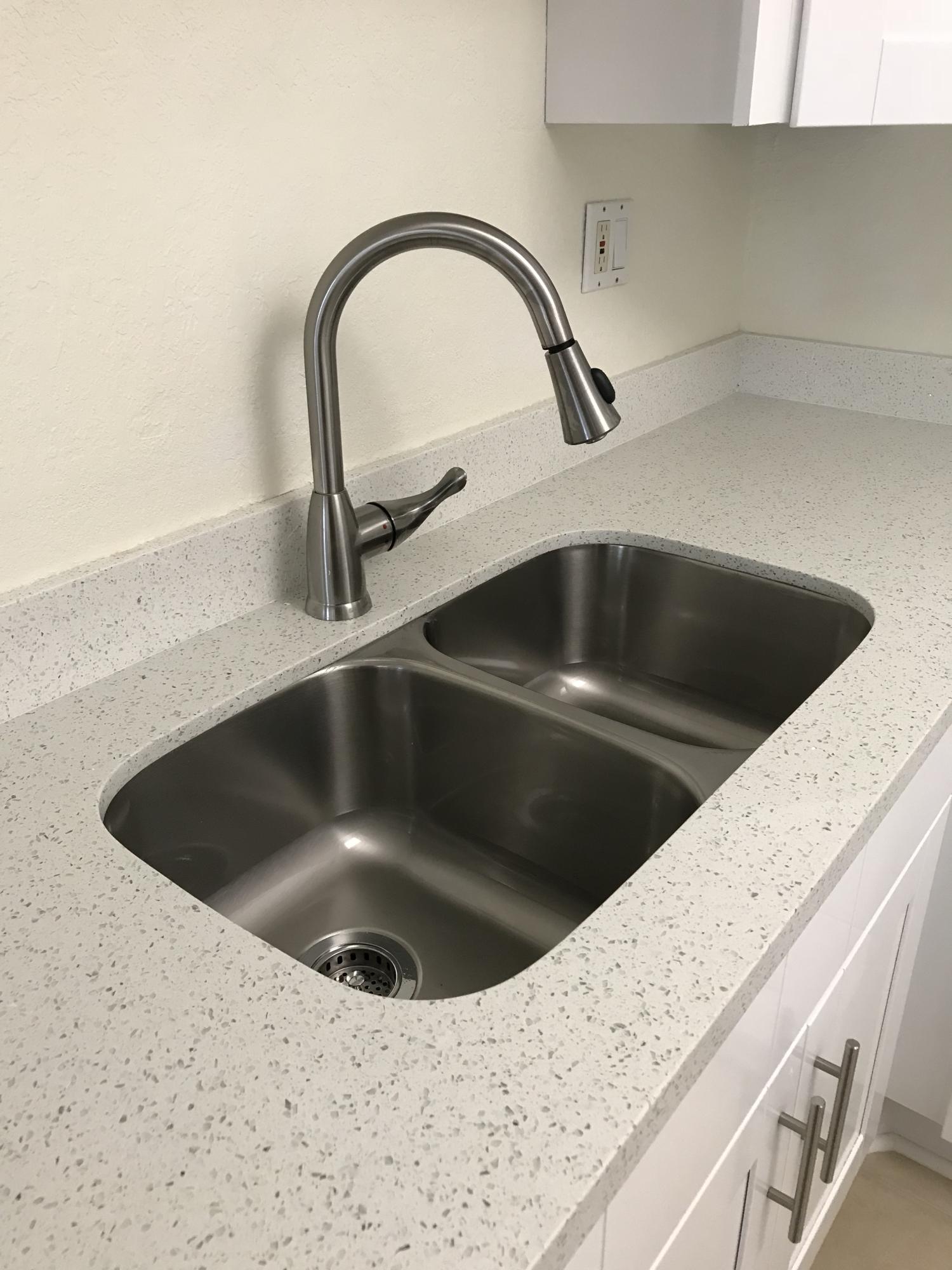 8249 Thames Boulevard, Unit B Boca Raton, FL 33433 - Photo 5 of 46 a close view of sink and tap