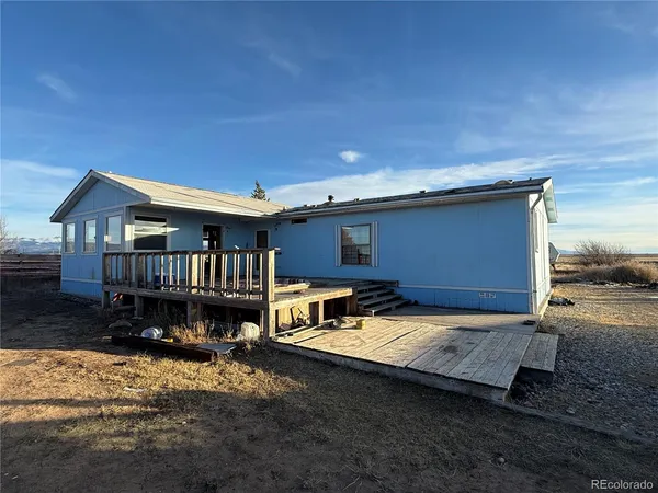 a front view of a house with yard