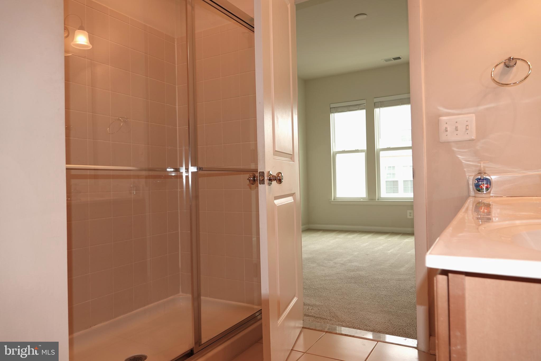 110 Strummer Lane Gaithersburg, MD 20878 - Photo 12 of 22 a bathroom with a shower