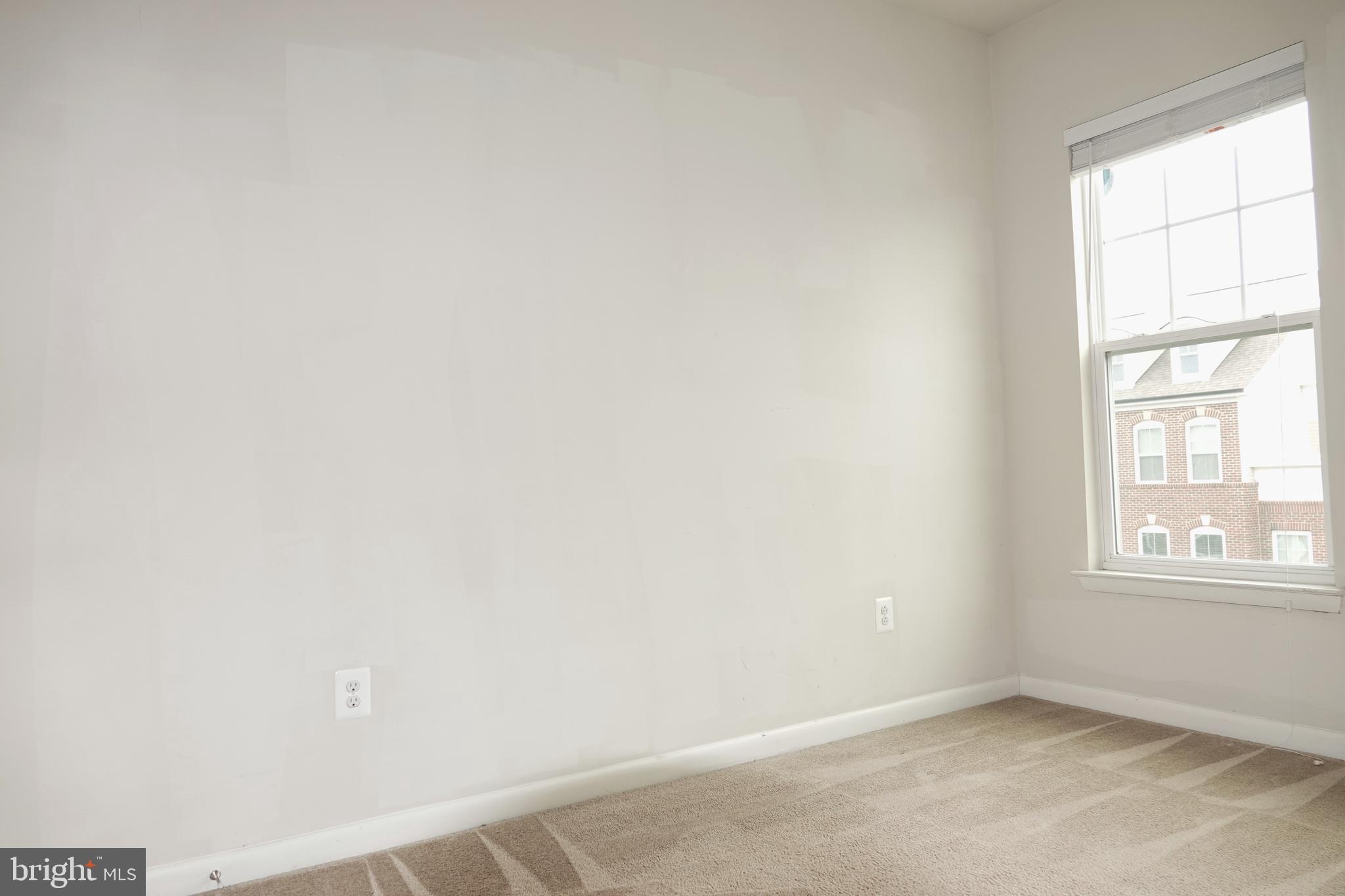 110 Strummer Lane Gaithersburg, MD 20878 - Photo 15 of 22 an empty room with a window