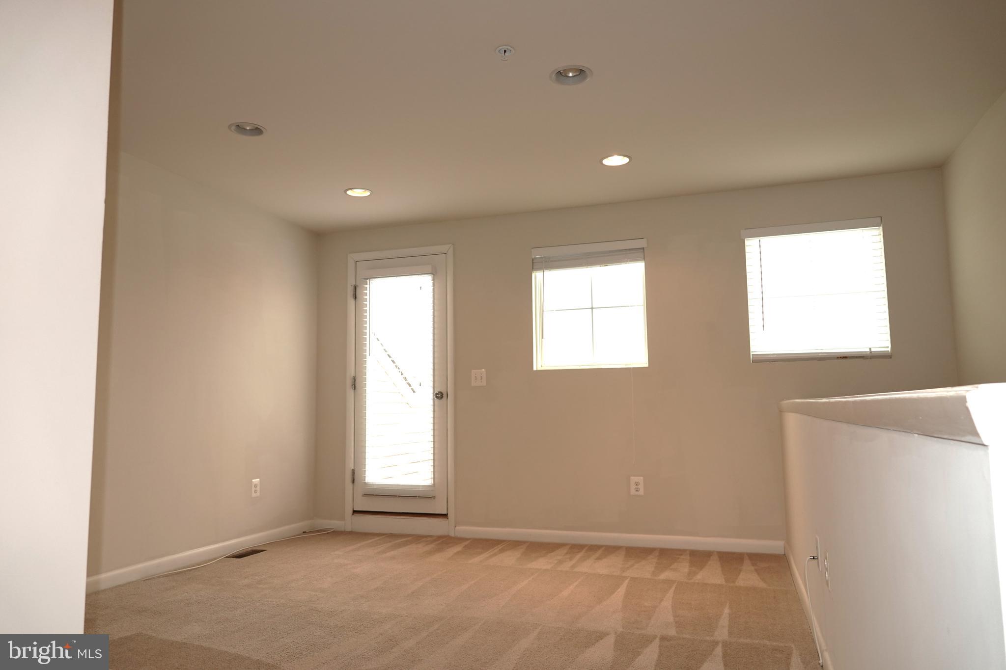 110 Strummer Lane Gaithersburg, MD 20878 - Photo 18 of 22 a view of an empty room with a window