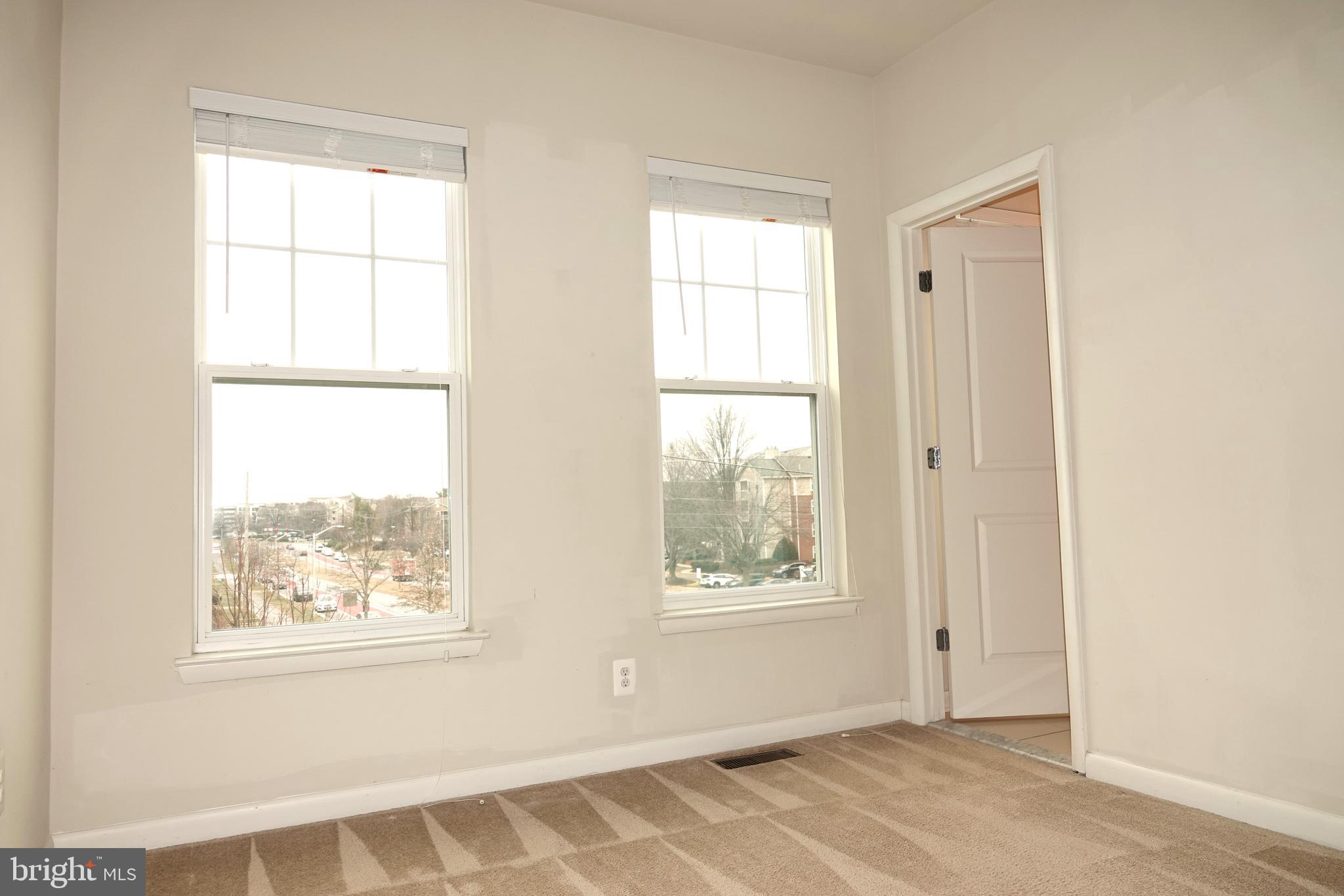 110 Strummer Lane Gaithersburg, MD 20878 - Photo 19 of 22 a view of an empty room with a window