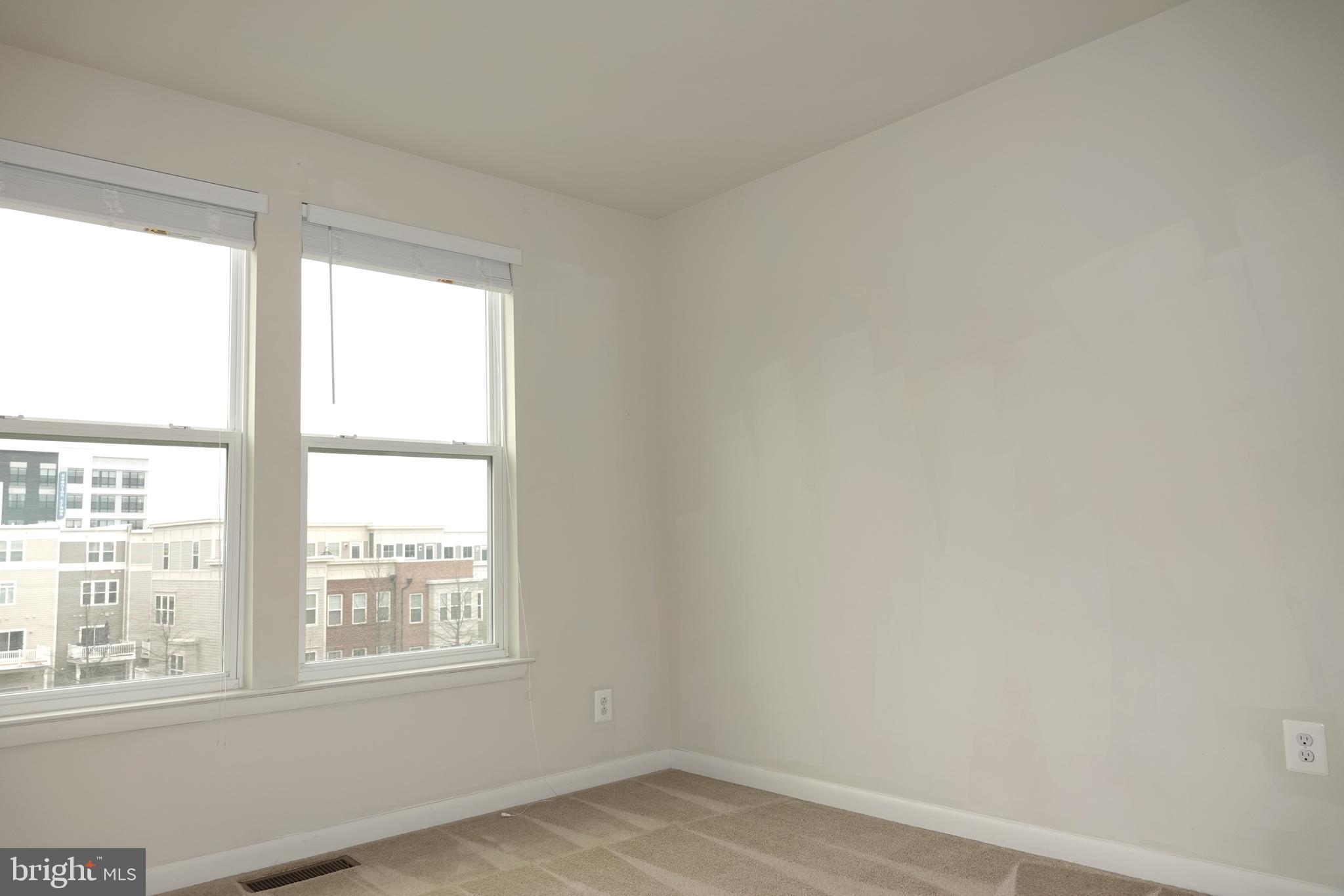 110 Strummer Lane Gaithersburg, MD 20878 - Photo 20 of 22 an empty room with a window