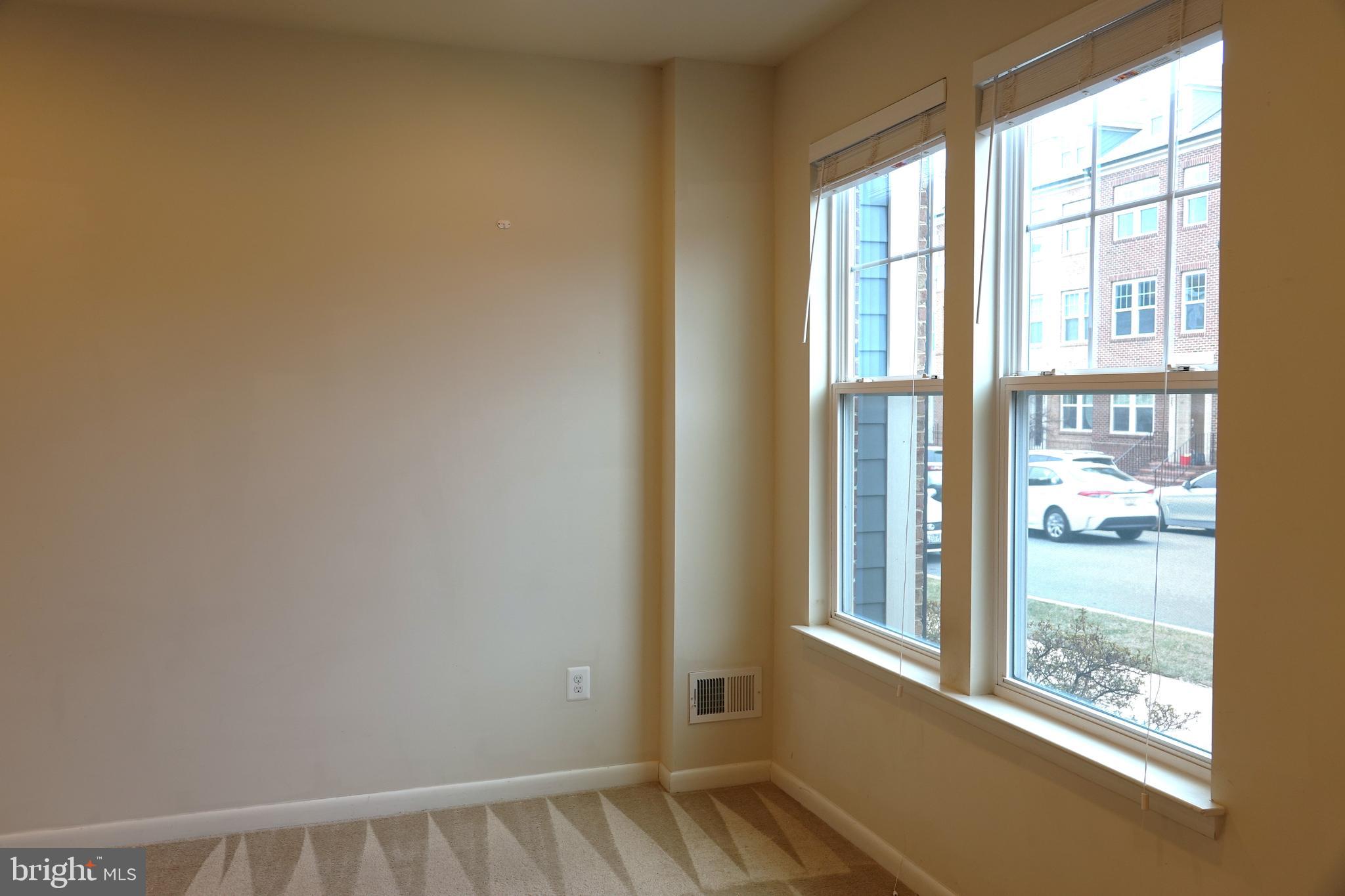 110 Strummer Lane Gaithersburg, MD 20878 - Photo 10 of 22 a view of an empty room with a window