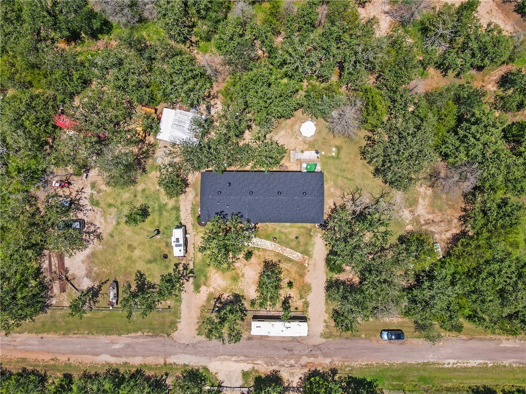 735 Boysenberry Road Somerville, TX 77879 - Photo 24 of 27 front view of a house with a yard