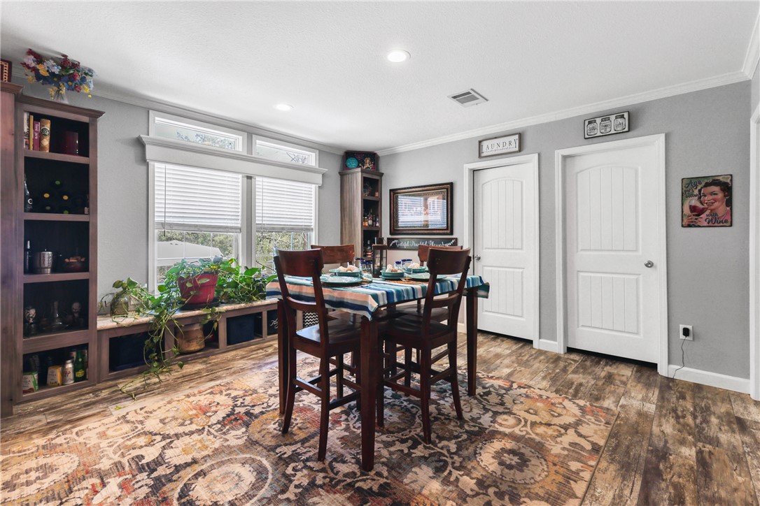 735 Boysenberry Road Somerville, TX 77879 - Photo 6 of 27 a view of a dining room with furniture window and outside view