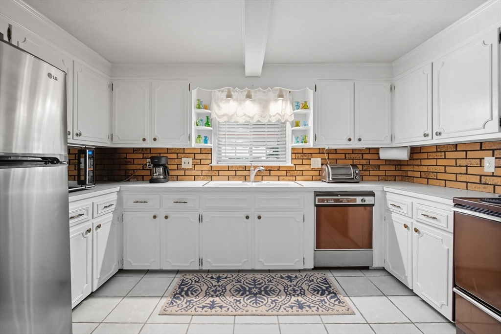 43 Greenleaf Avenue West Springfield, MA 01089 - Photo 13 of 37 a kitchen with granite countertop white cabinets white stainless steel appliances with a sink and dishwasher