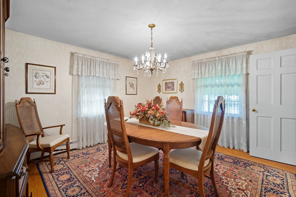 43 Greenleaf Avenue West Springfield, MA 01089 - Photo 14 of 37 a view of a dining room with furniture and a chandelier