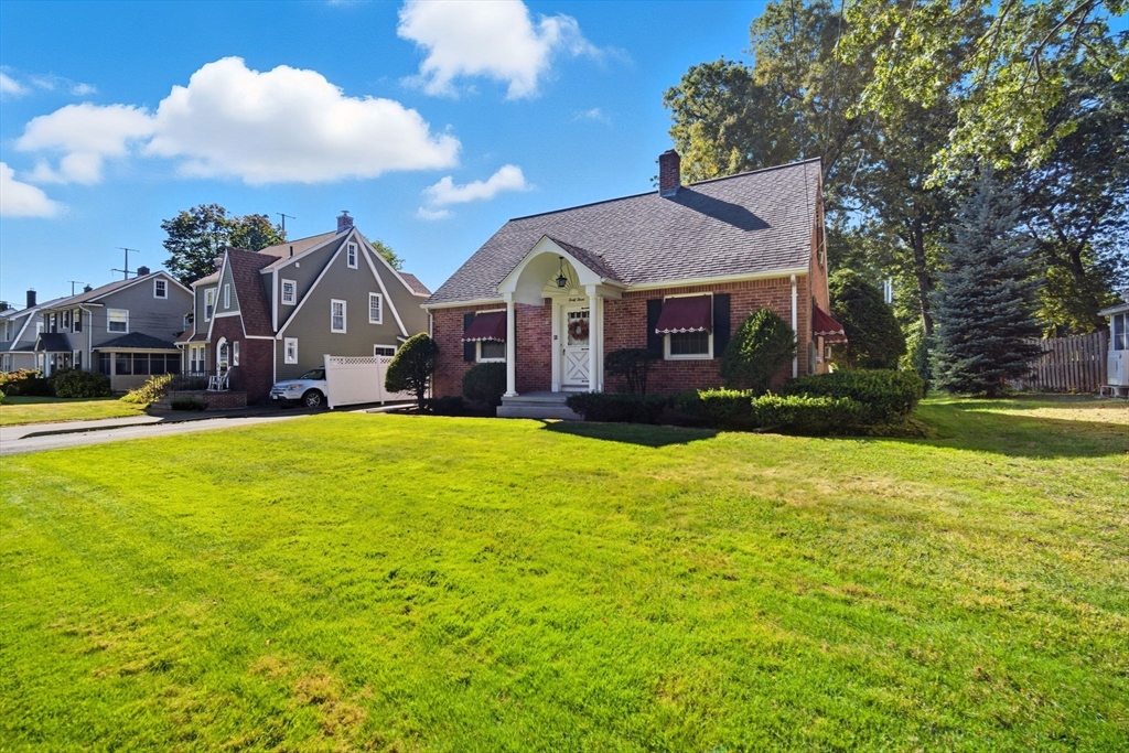 43 Greenleaf Avenue West Springfield, MA 01089 - Photo 3 of 37 a view of a big house with a big yard and large trees