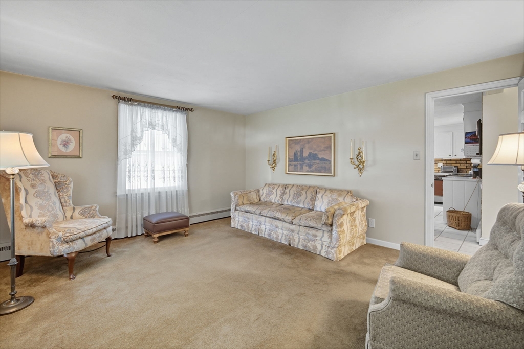 43 Greenleaf Avenue West Springfield, MA 01089 - Photo 7 of 37 a living room with furniture and a couch