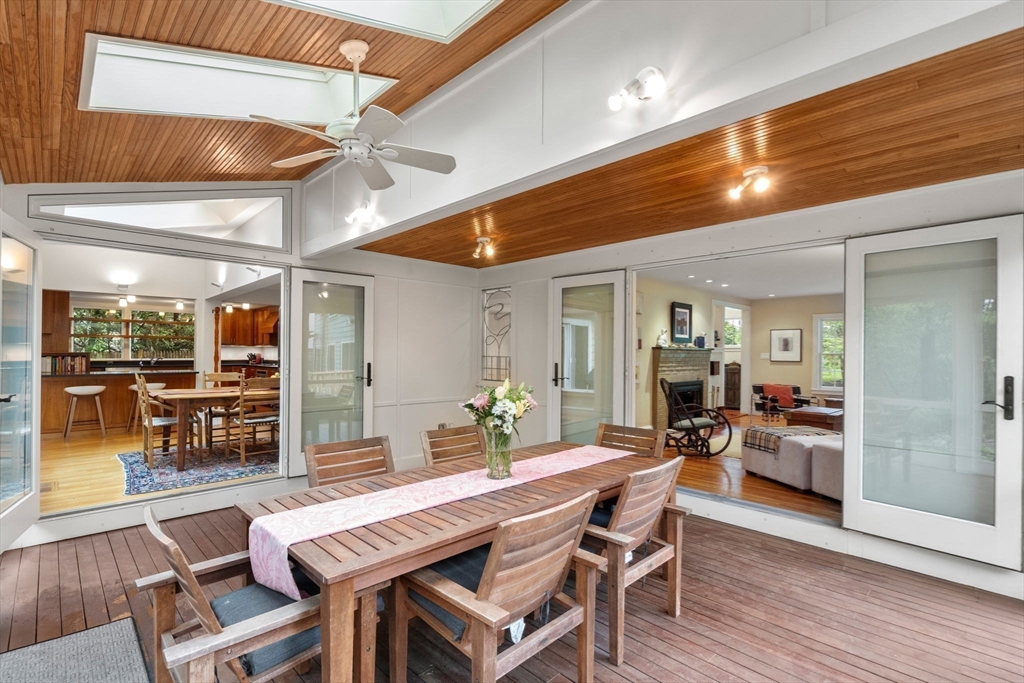 33 Manchester Road Newton, MA 02461 - Photo 15 of 31 a dining room with furniture and wooden floor