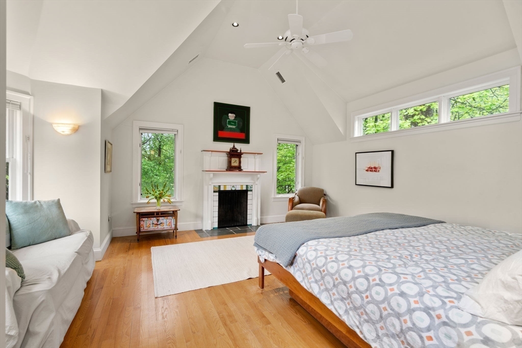 33 Manchester Road Newton, MA 02461 - Photo 17 of 31 a bedroom with a bed and a couch