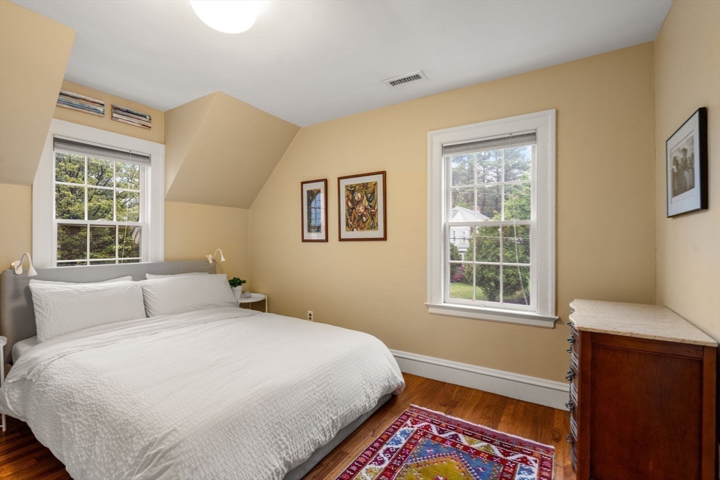 33 Manchester Road Newton, MA 02461 - Photo 20 of 31 a bedroom with a bed and a window
