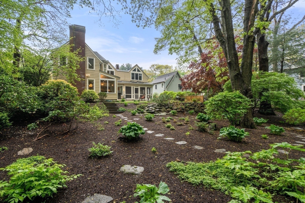 33 Manchester Road Newton, MA 02461 - Photo 26 of 31 a front view of a house with a yard