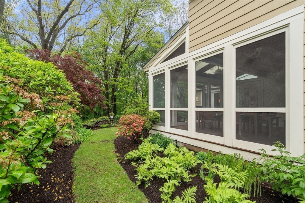 33 Manchester Road Newton, MA 02461 - Photo 29 of 31 a view of a backyard with potted plants